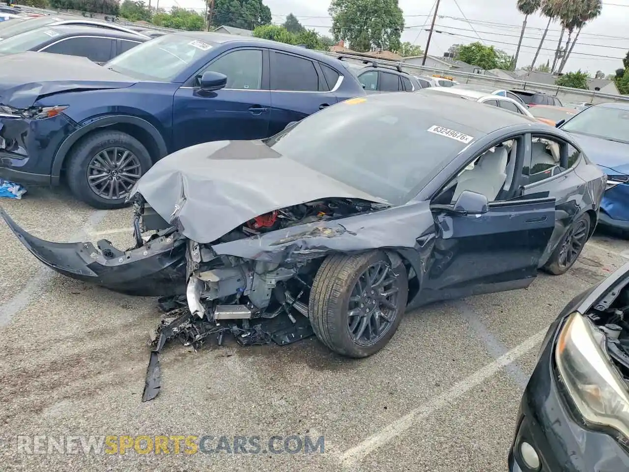 1 Photograph of a damaged car 5YJ3E1EB3SF000951 TESLA MODEL 3 2025