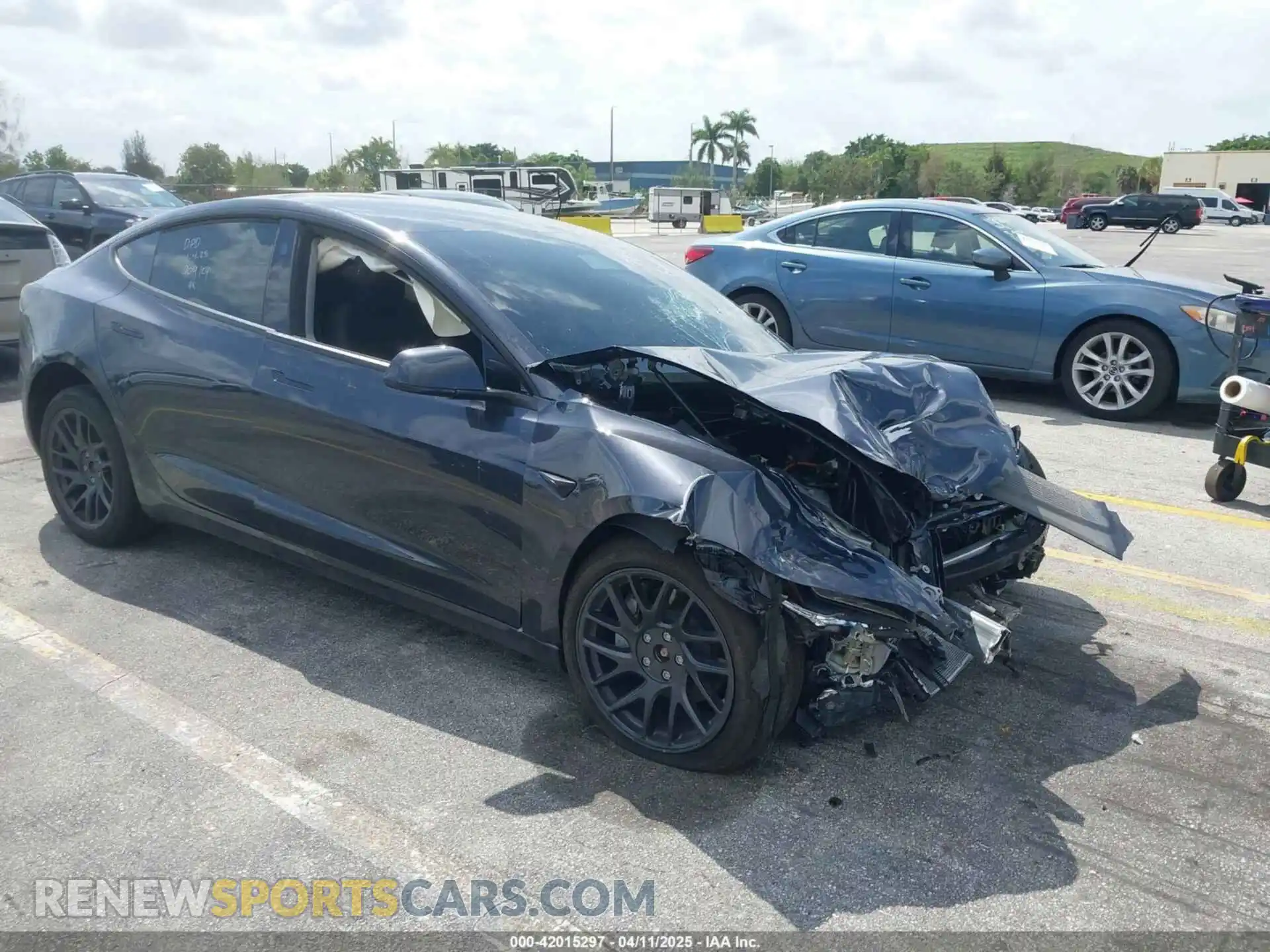 1 Photograph of a damaged car 5YJ3E1EBXSF909124 TESLA MODEL 3 2025