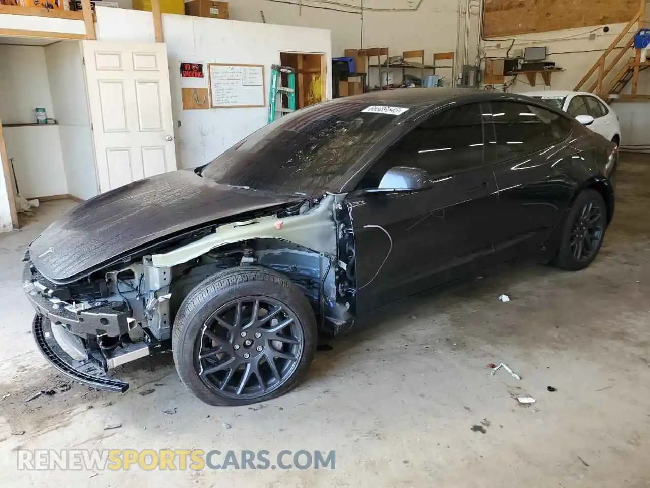 1 Photograph of a damaged car 5YJ3E1EBXSF929759 TESLA MODEL 3 2025
