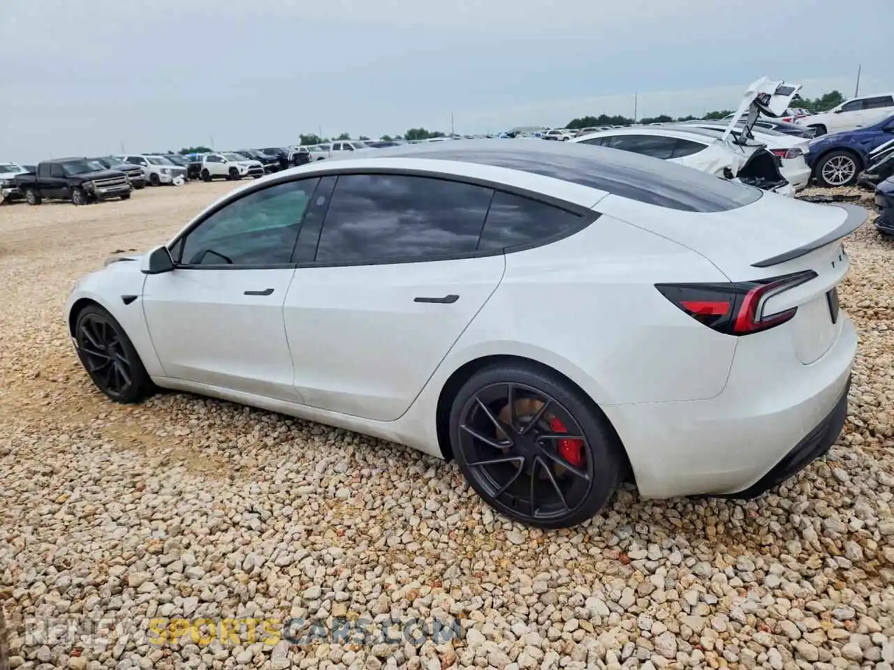 2 fotografías del automóvil dañado 5YJ3E1ET9SF077851 TESLA MODEL 3 2025