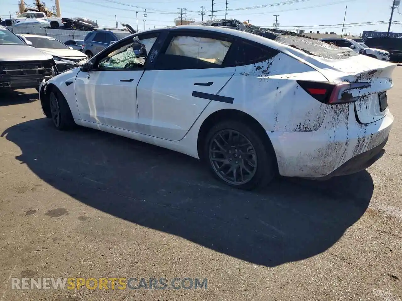 2 fotografías del automóvil dañado 5YJ3E1EA3TF189318 TESLA MODEL 3 2026