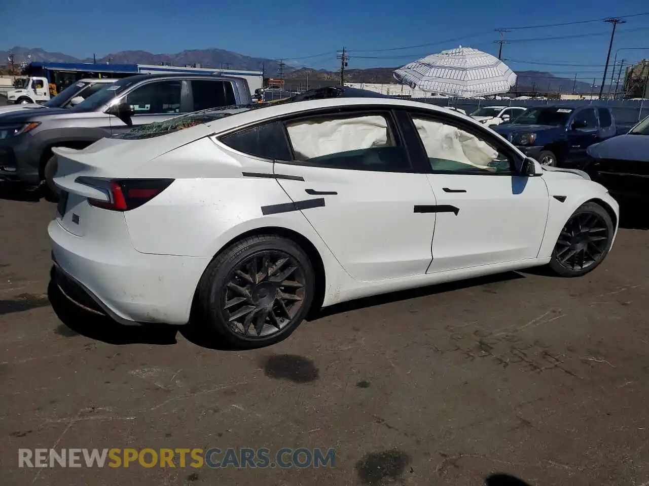 3 fotografías del automóvil dañado 5YJ3E1EA3TF189318 TESLA MODEL 3 2026