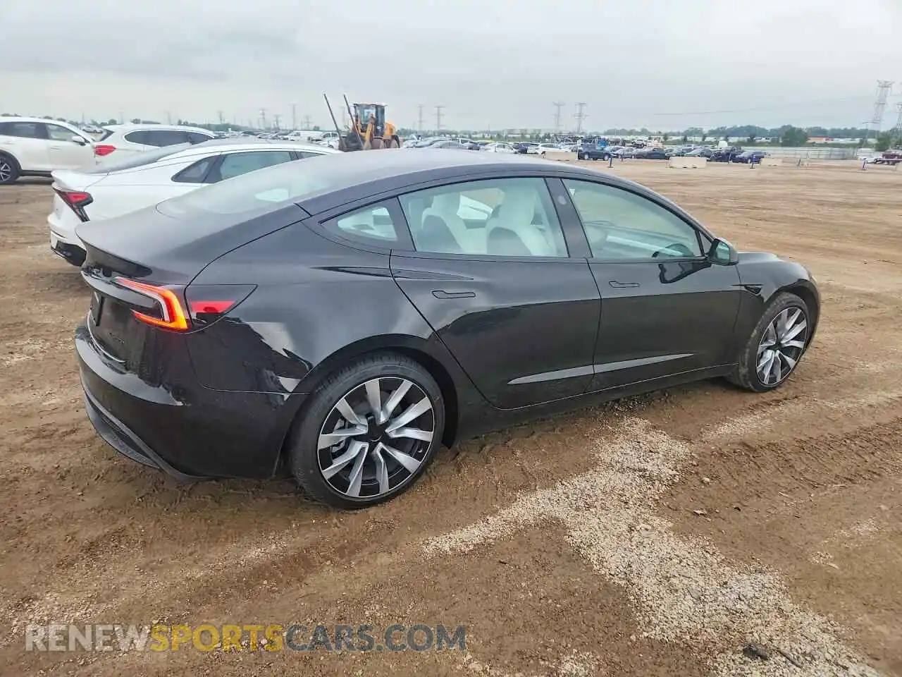3 fotografías del automóvil dañado 5YJ3E1EB3TF215859 TESLA MODEL 3 2026