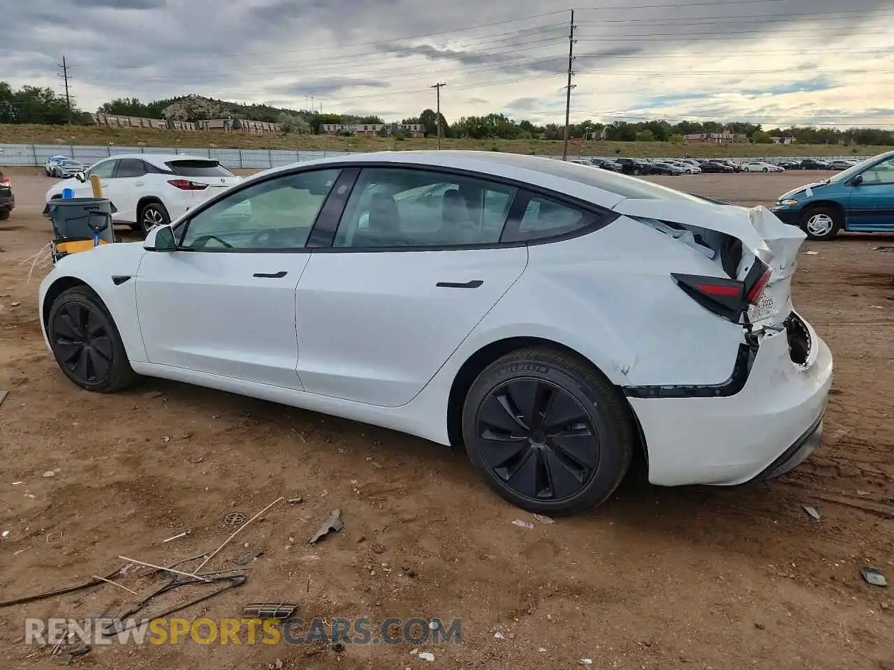 2 fotografías del automóvil dañado 5YJ3E1EB3TF219619 TESLA MODEL 3 2026