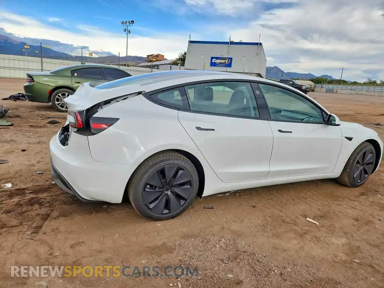 3 fotografías del automóvil dañado 5YJ3E1EB3TF219619 TESLA MODEL 3 2026