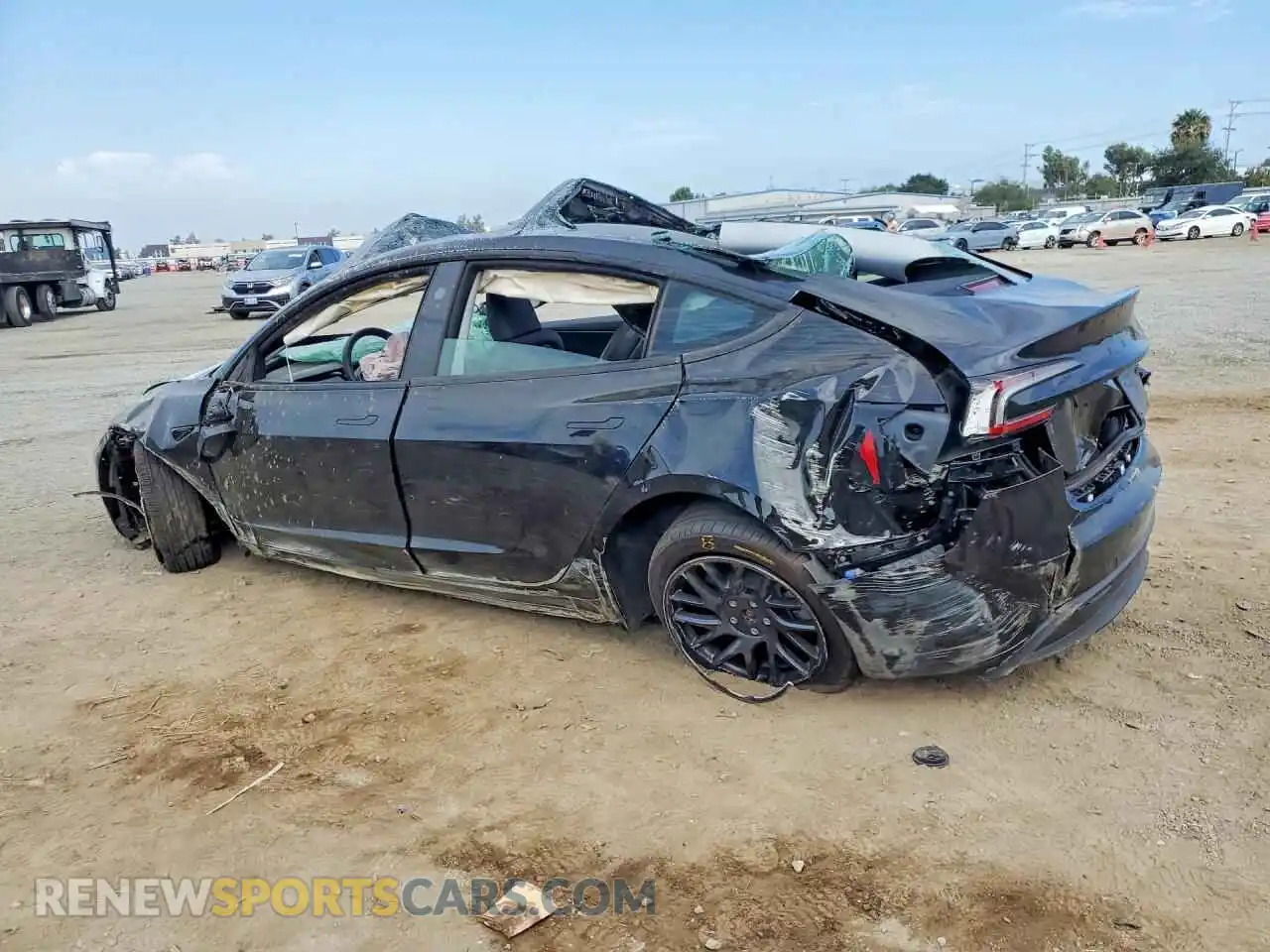 2 fotografías del automóvil dañado 5YJ3E1EB5TF160735 TESLA MODEL 3 2026