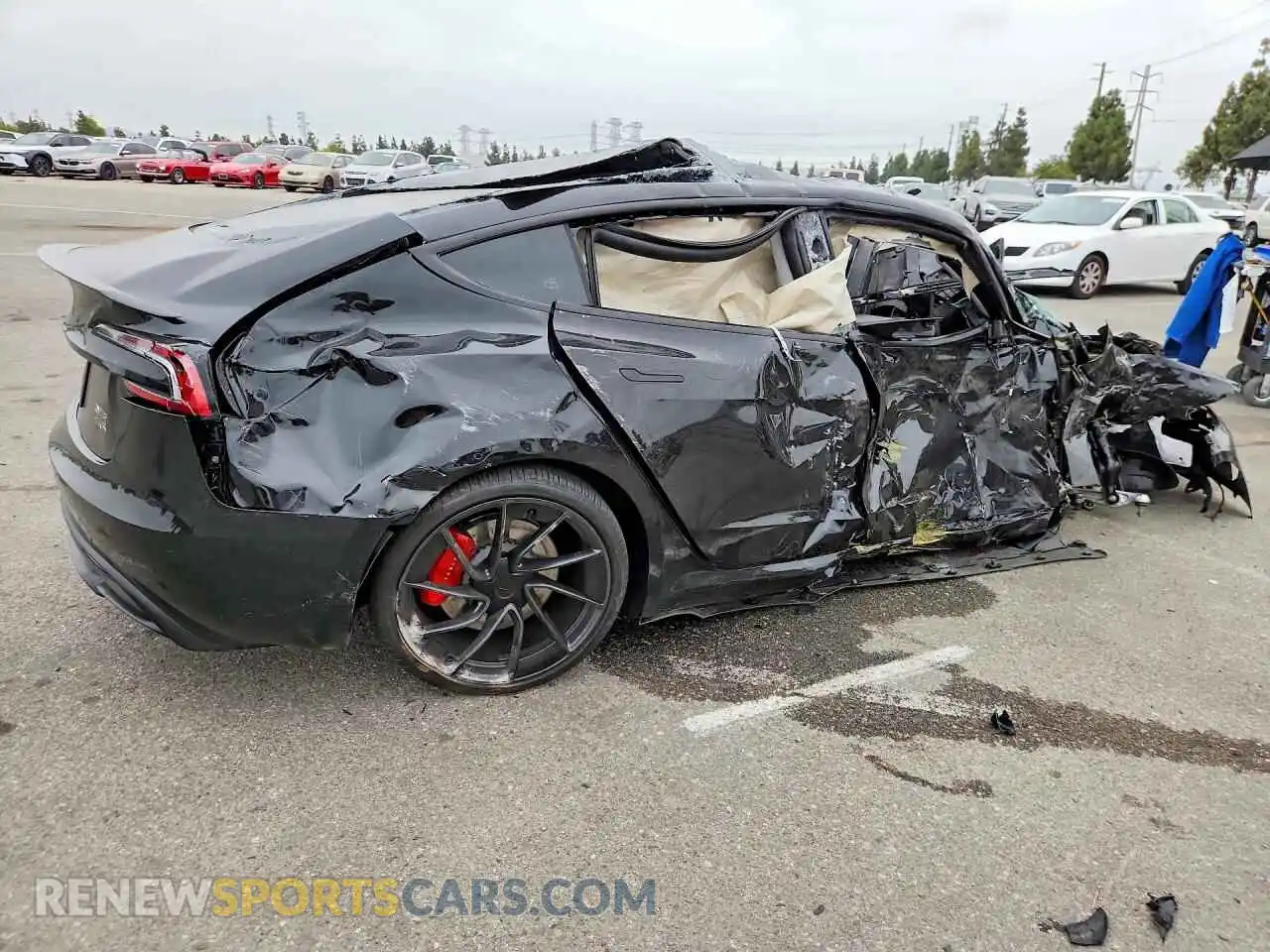 3 Photograph of a damaged car 5YJ3E1ET0TF195000 TESLA MODEL 3 2026