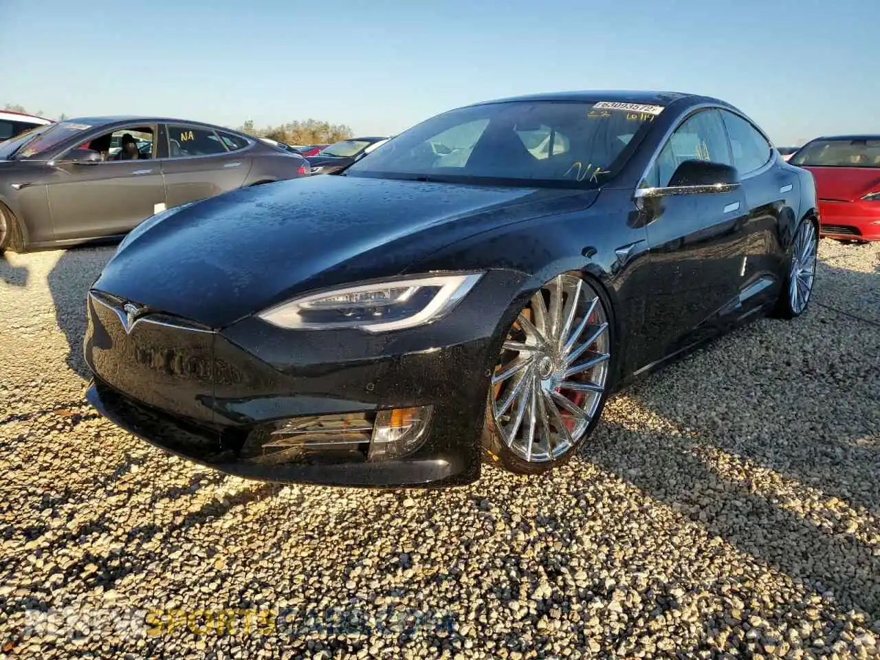 2 fotografías del automóvil dañado 5YJSA1E4XKF308997 TESLA MODEL S 2019
