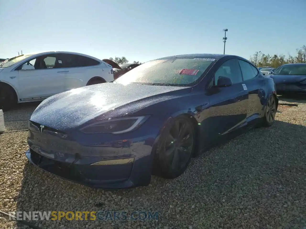 2 fotografías del automóvil dañado 5YJSA1E62NF478289 TESLA MODEL S 2022