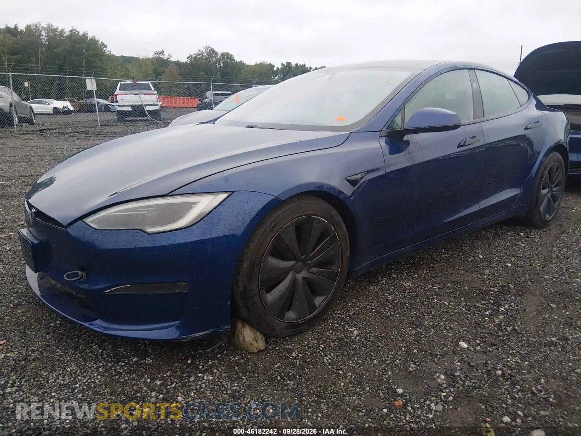 2 fotografías del automóvil dañado 5YJSA1E51PF502947 TESLA MODEL S 2023