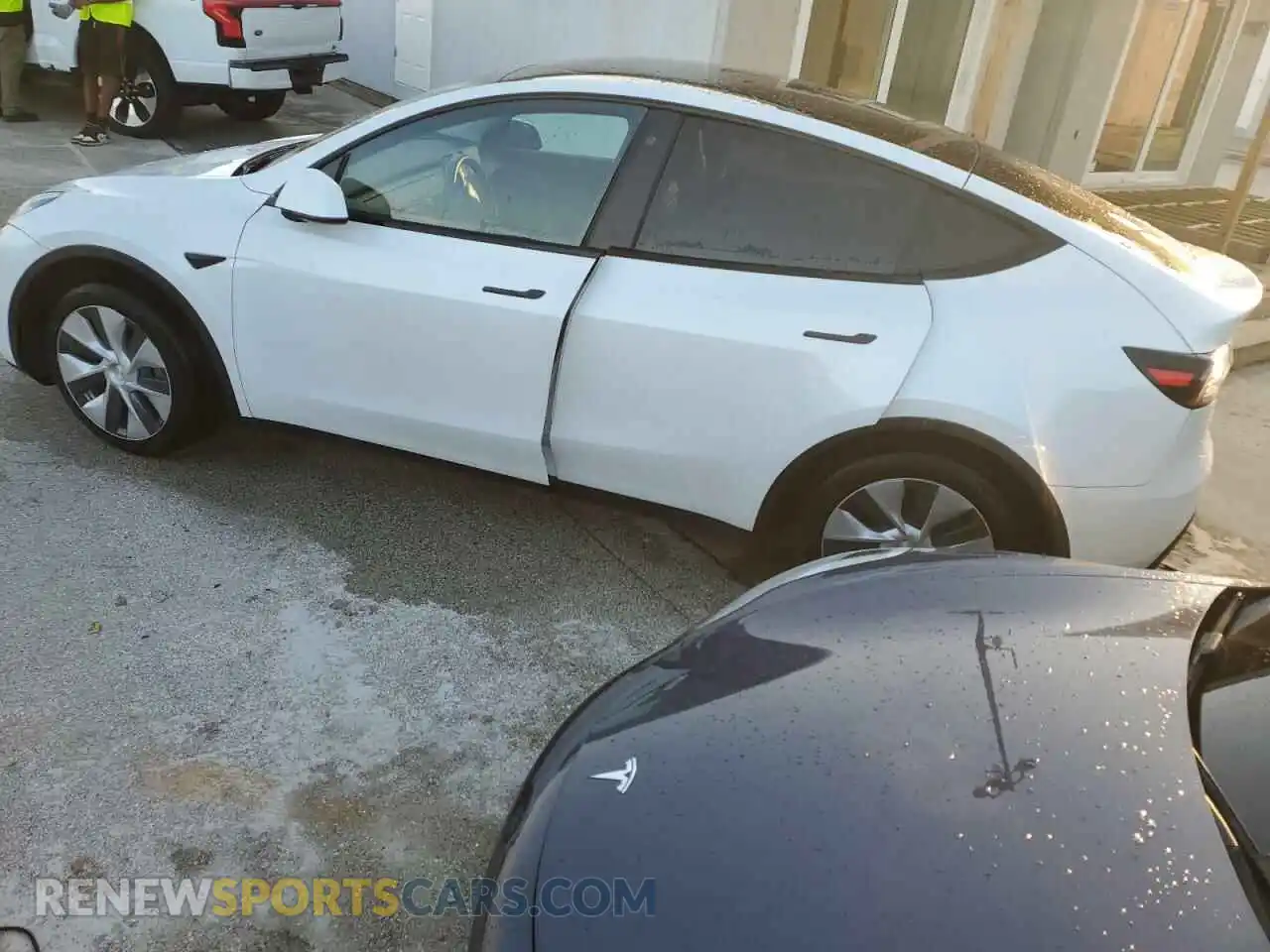 2 Photograph of a damaged car 5YJYGDEE0LF006817 TESLA MODEL Y 2020