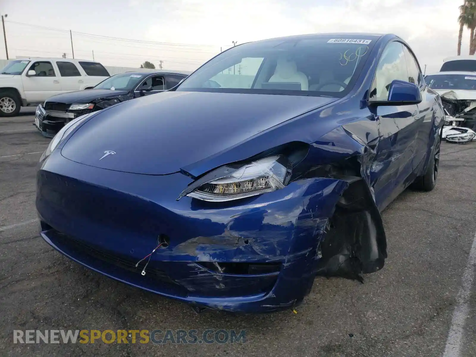 2 Photograph of a damaged car 5YJYGDEE0LF034228 TESLA MODEL Y 2020