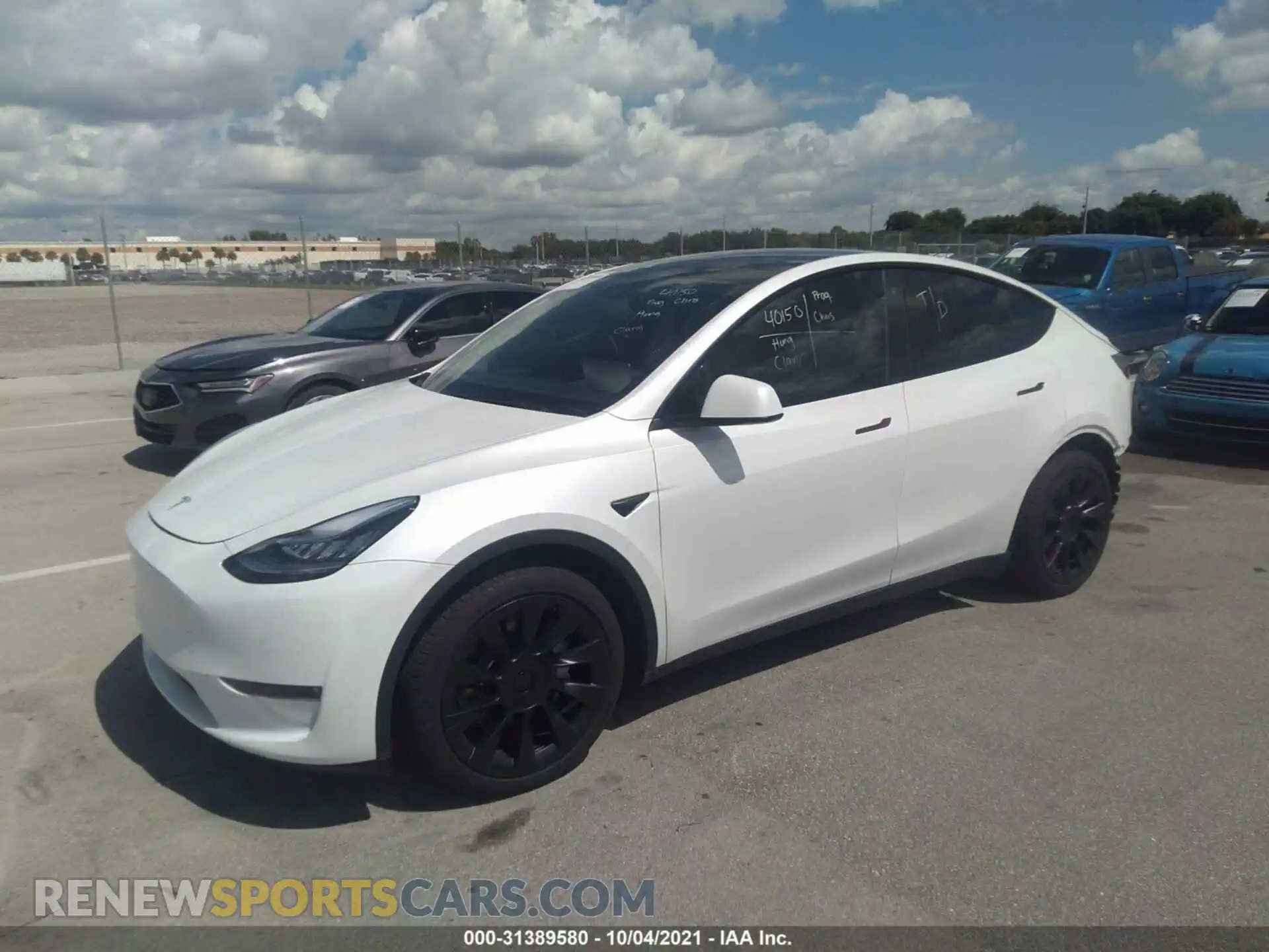 2 Photograph of a damaged car 5YJYGDEE0LF037159 TESLA MODEL Y 2020
