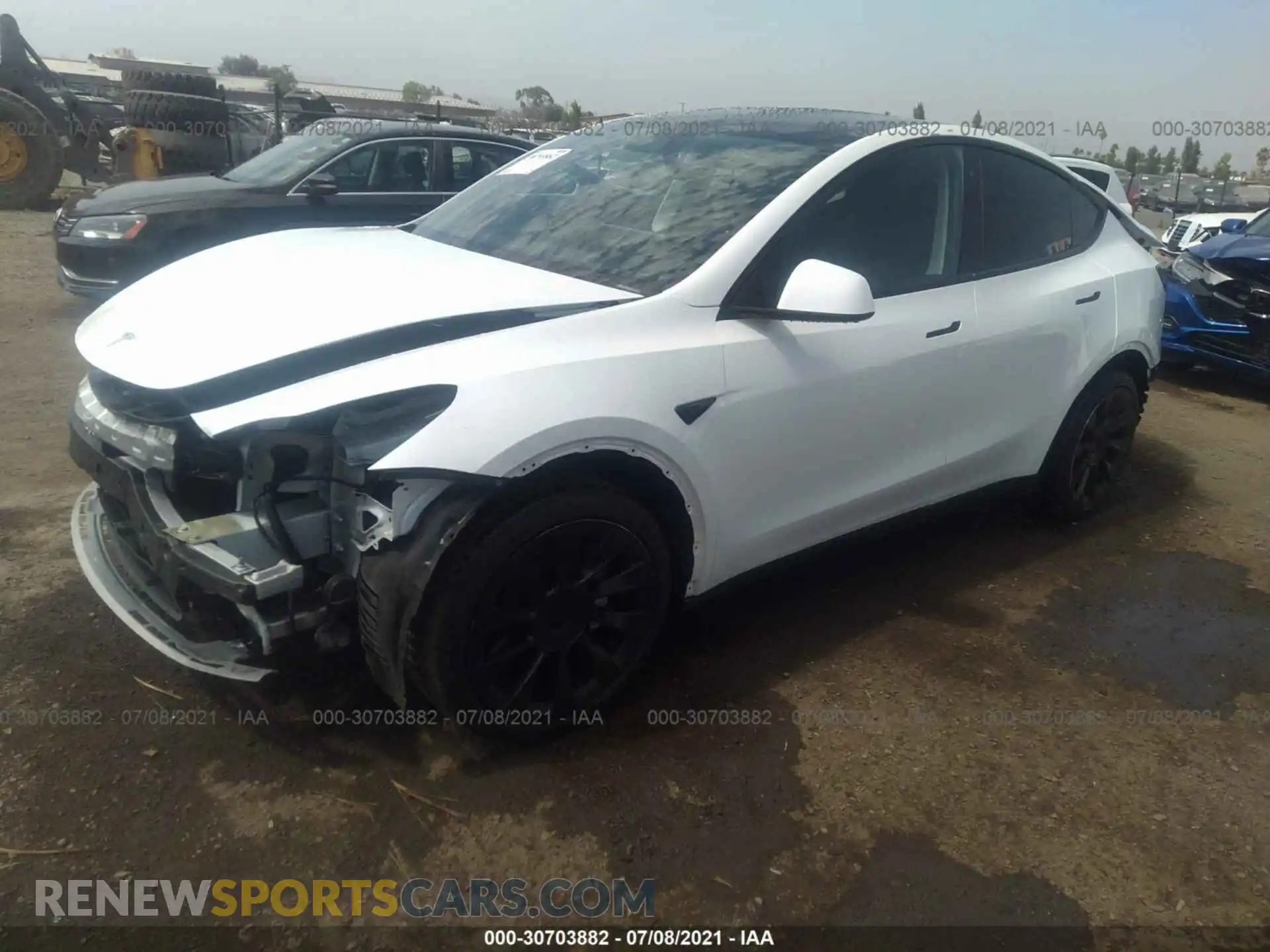 2 fotografías del automóvil dañado 5YJYGDEE1LF058361 TESLA MODEL Y 2020