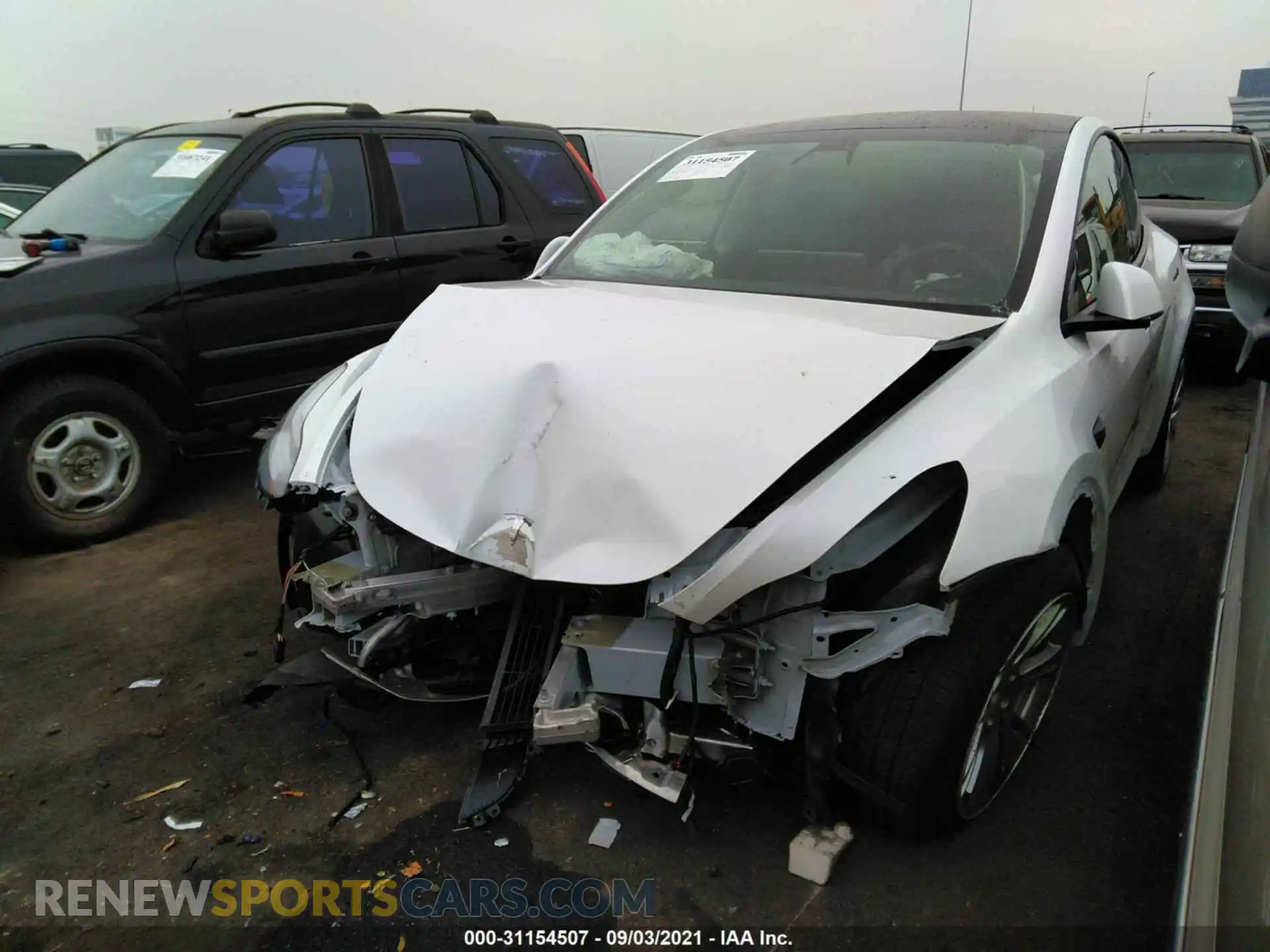 2 Photograph of a damaged car 5YJYGDEE6LF057870 TESLA MODEL Y 2020
