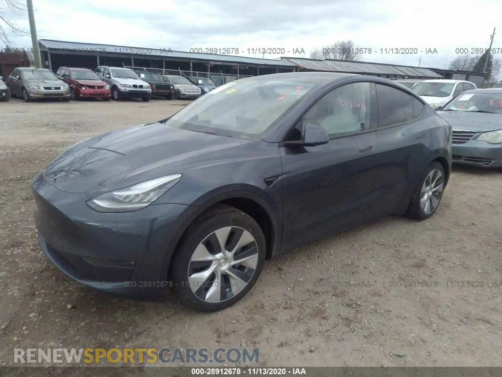2 Photograph of a damaged car 5YJYGDEE8LF049611 TESLA MODEL Y 2020