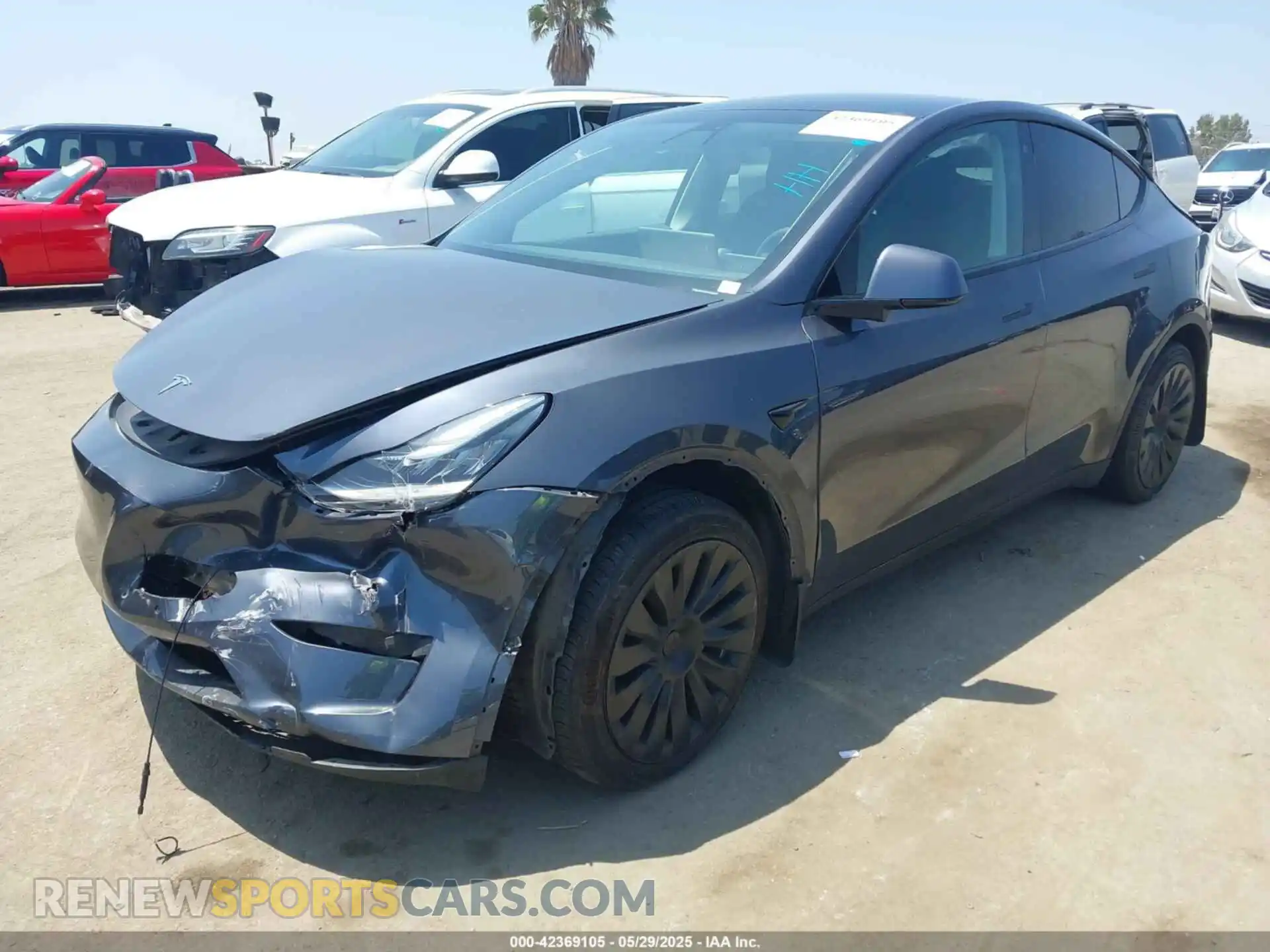 2 fotografías del automóvil dañado 5YJYGDEEXLF010356 TESLA MODEL Y 2020