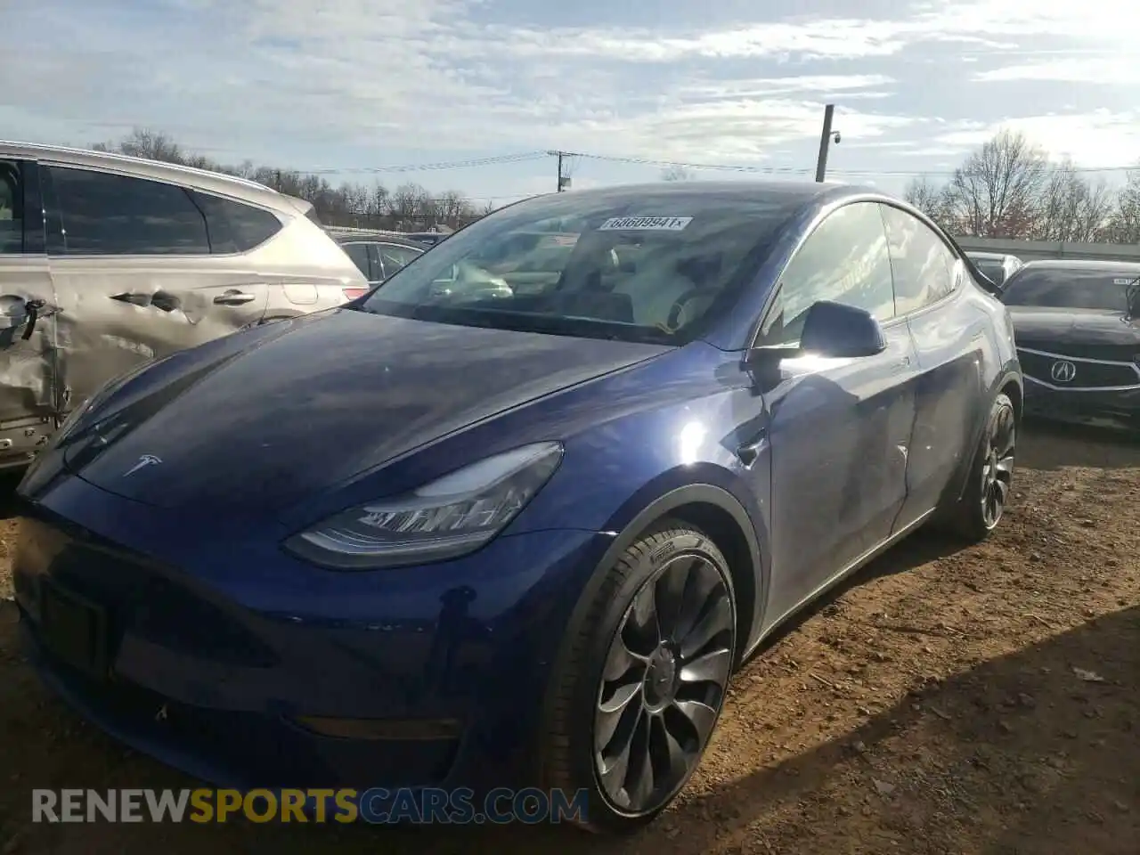 2 fotografías del automóvil dañado 5YJYGDEF9LF049626 TESLA MODEL Y 2020