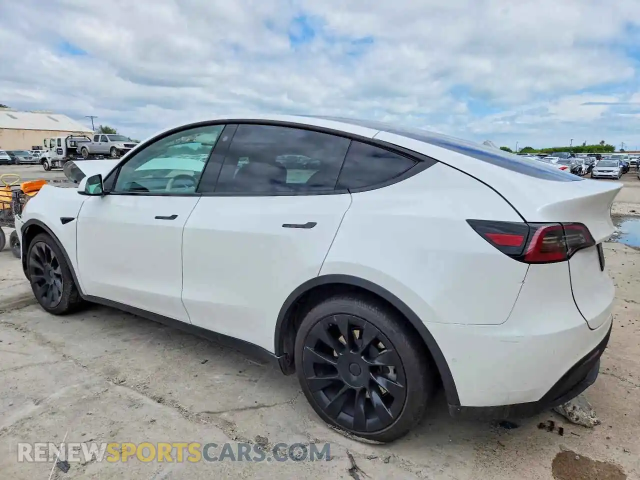 2 fotografías del automóvil dañado 5YJYGAED1MF210792 TESLA MODEL Y 2021