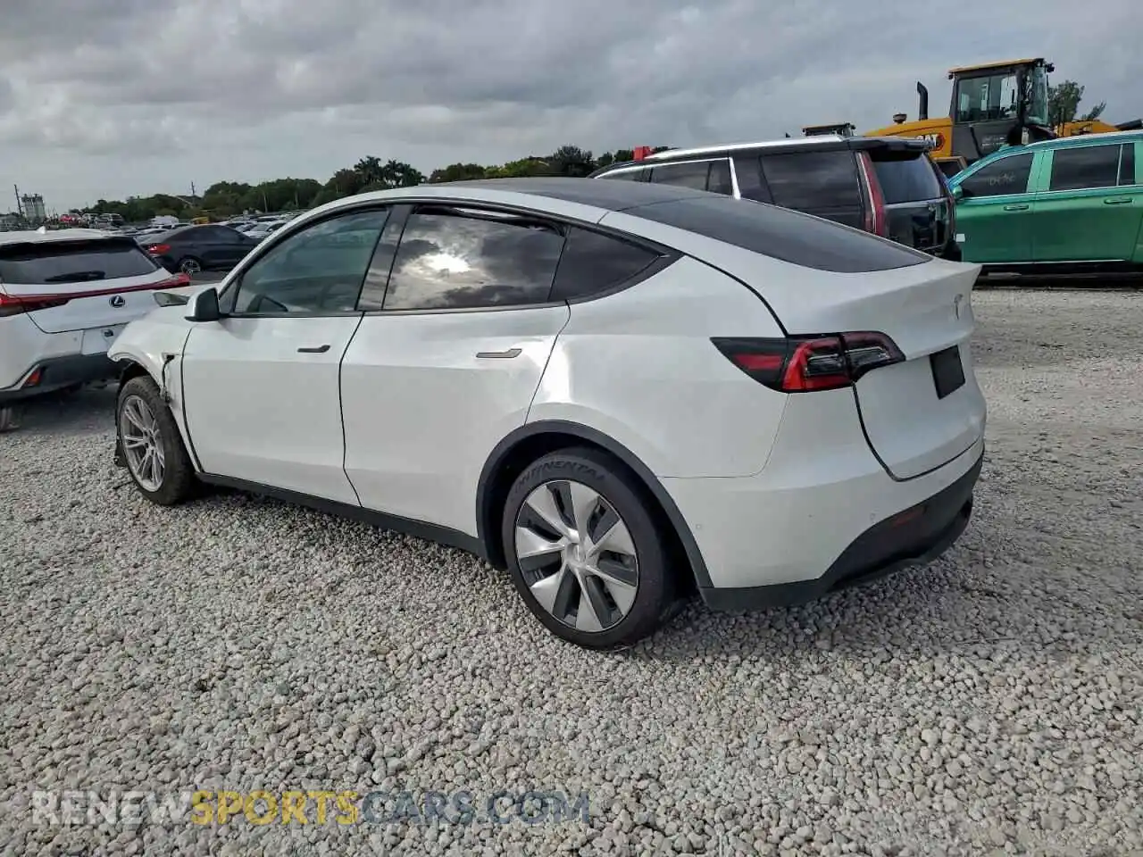 2 fotografías del automóvil dañado 5YJYGAED5MF116608 TESLA MODEL Y 2021
