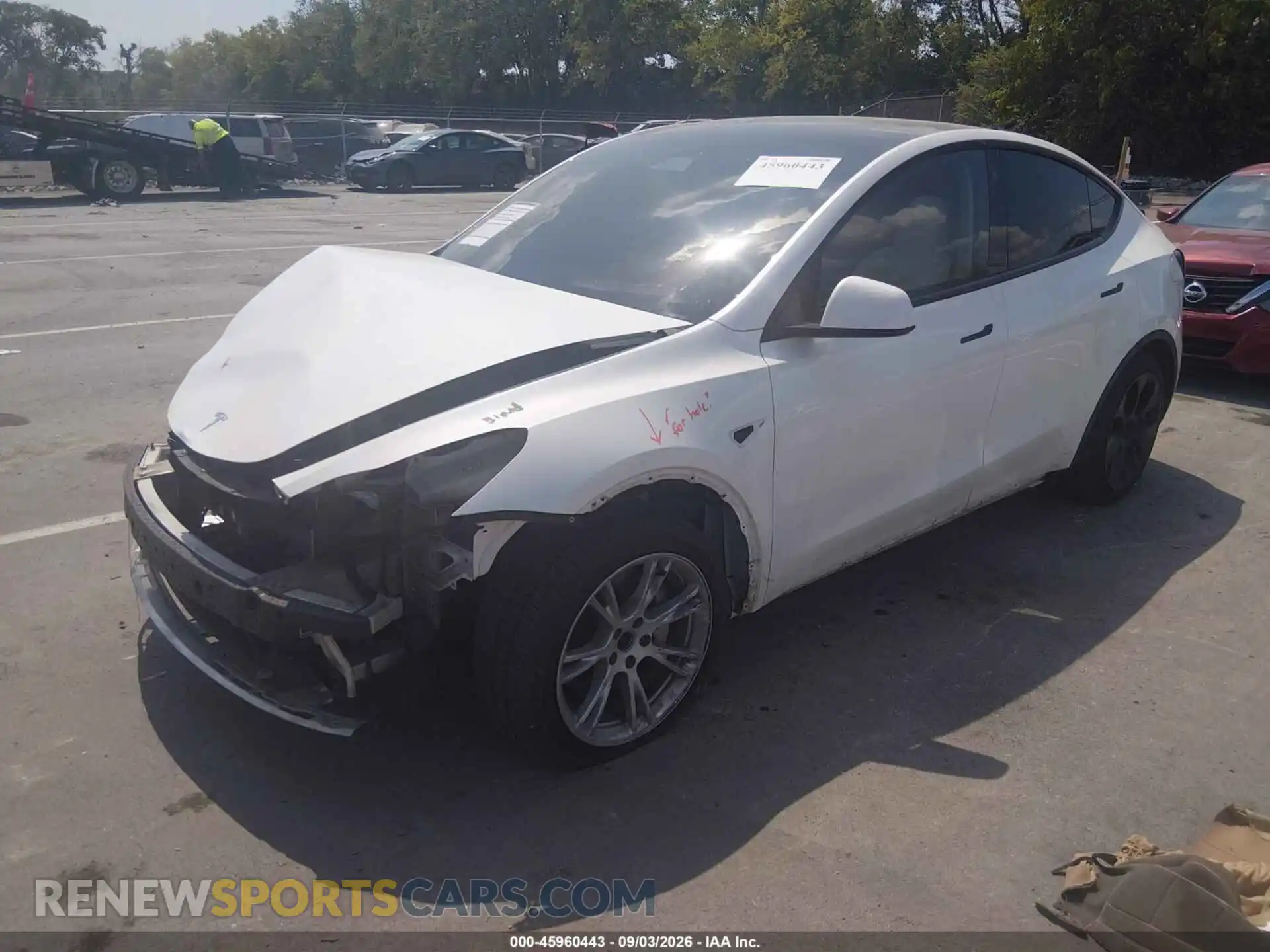 2 fotografías del automóvil dañado 5YJYGAEE0MF270586 TESLA MODEL Y 2021