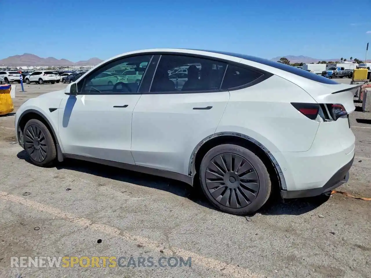 2 fotografías del automóvil dañado 5YJYGAEE1MF286604 TESLA MODEL Y 2021