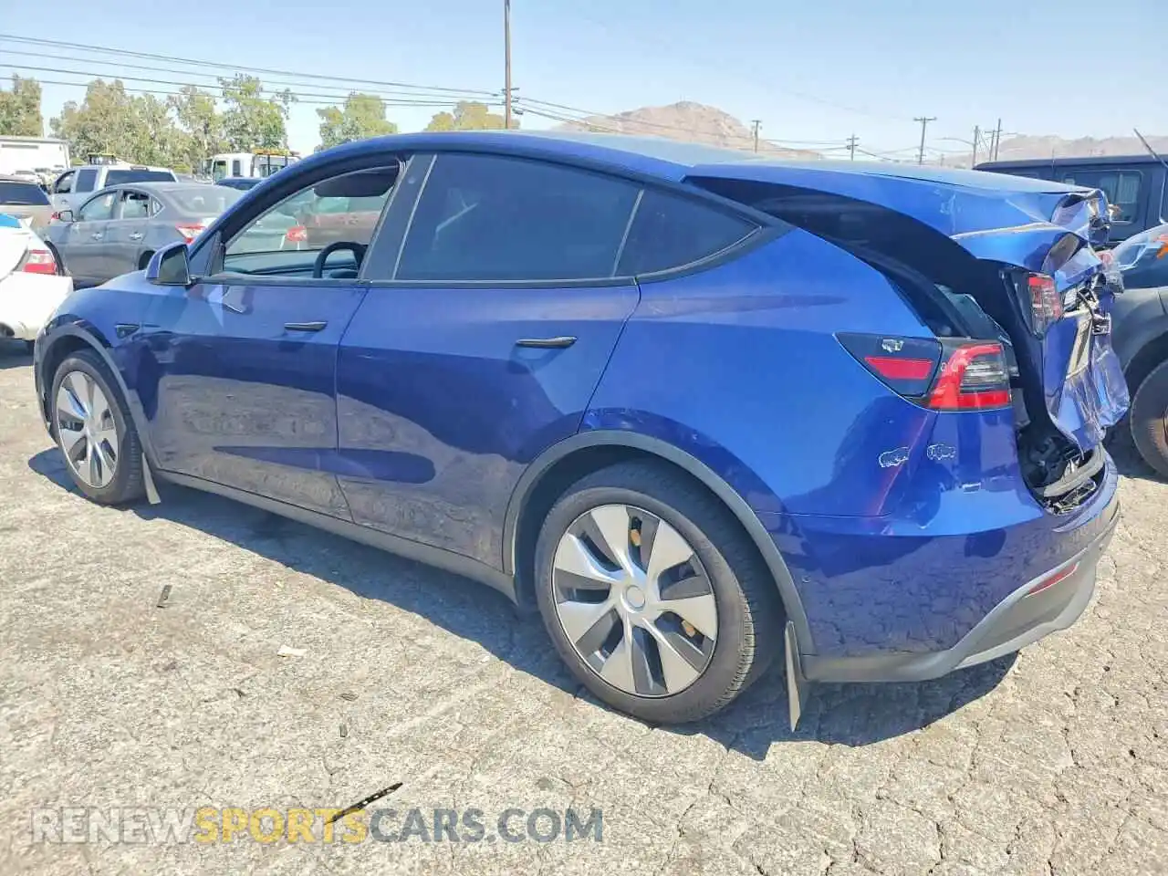 2 Photograph of a damaged car 5YJYGAEE2MF232082 TESLA MODEL Y 2021