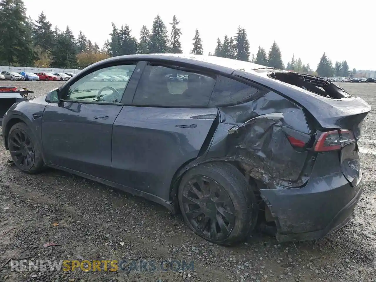 2 Photograph of a damaged car 5YJYGAEE2MF239579 TESLA MODEL Y 2021