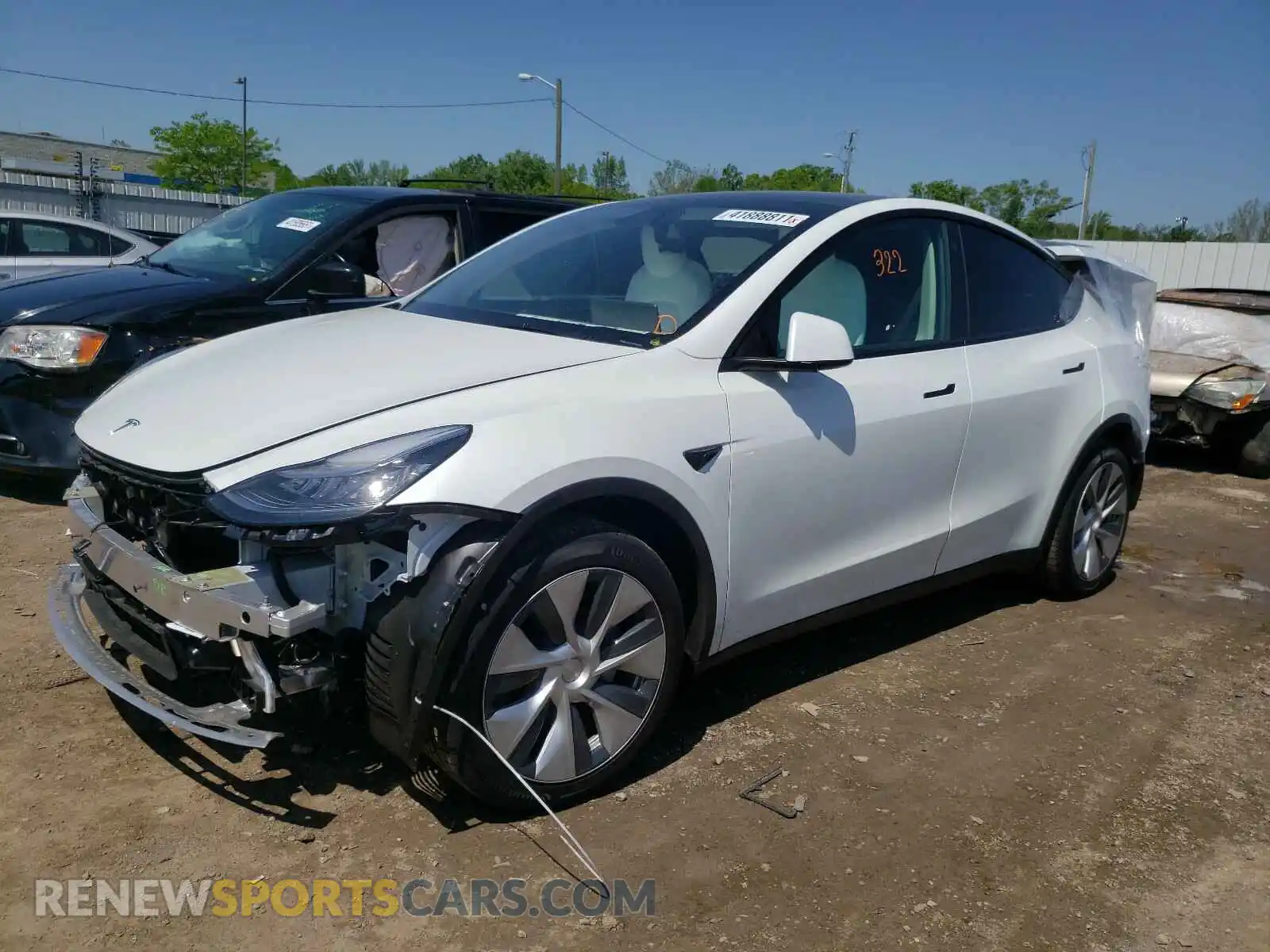 2 Photograph of a damaged car 5YJYGAEE7MF136867 TESLA MODEL Y 2021