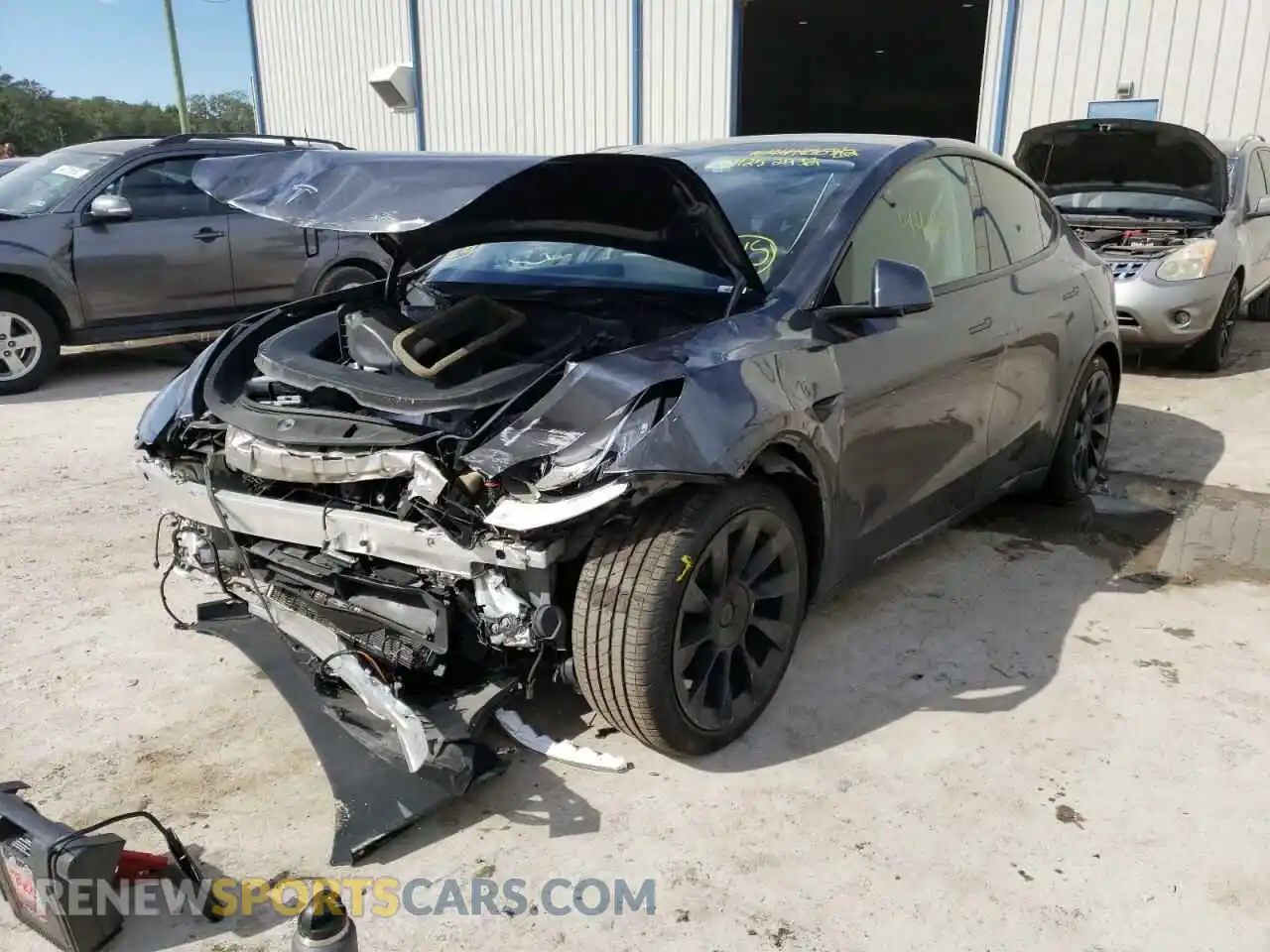 2 Photograph of a damaged car 5YJYGAEE7MF143088 TESLA MODEL Y 2021