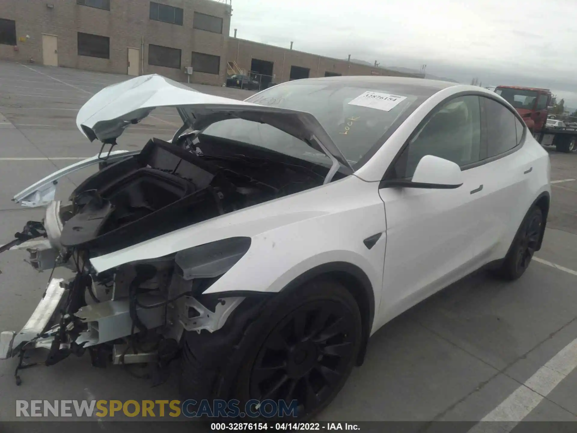 2 fotografías del automóvil dañado 5YJYGAEE7MF282802 TESLA MODEL Y 2021