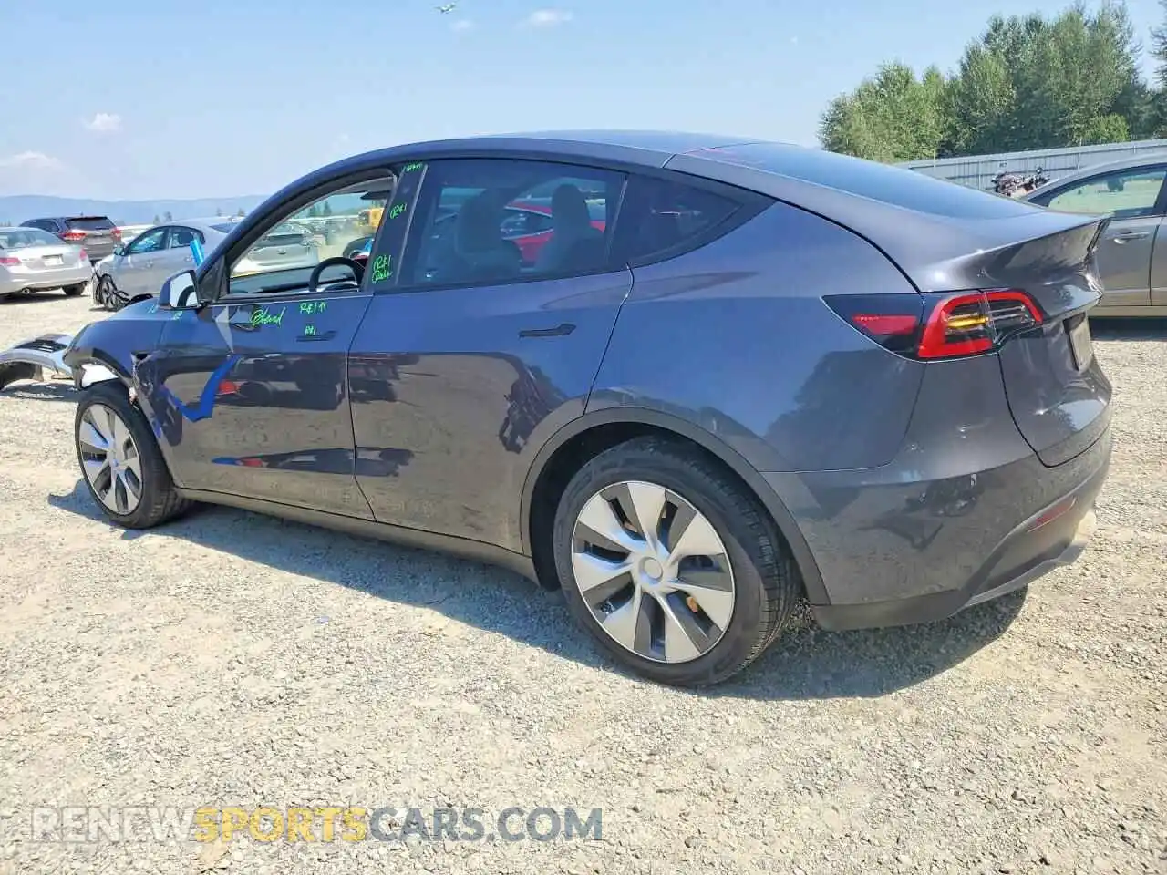 2 fotografías del automóvil dañado 5YJYGAEE8MF301504 TESLA MODEL Y 2021