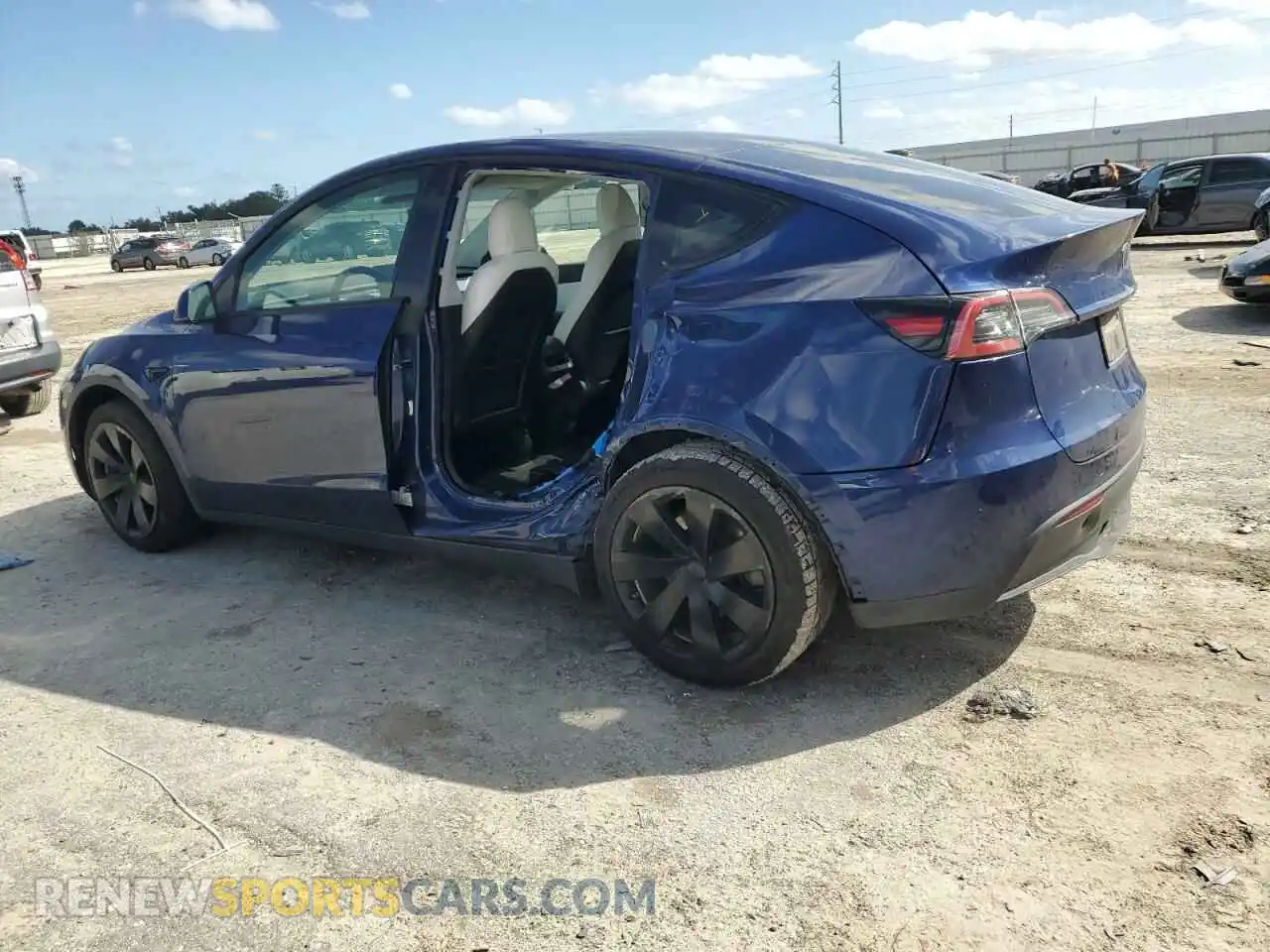 2 Photograph of a damaged car 5YJYGAEE9MF201220 TESLA MODEL Y 2021