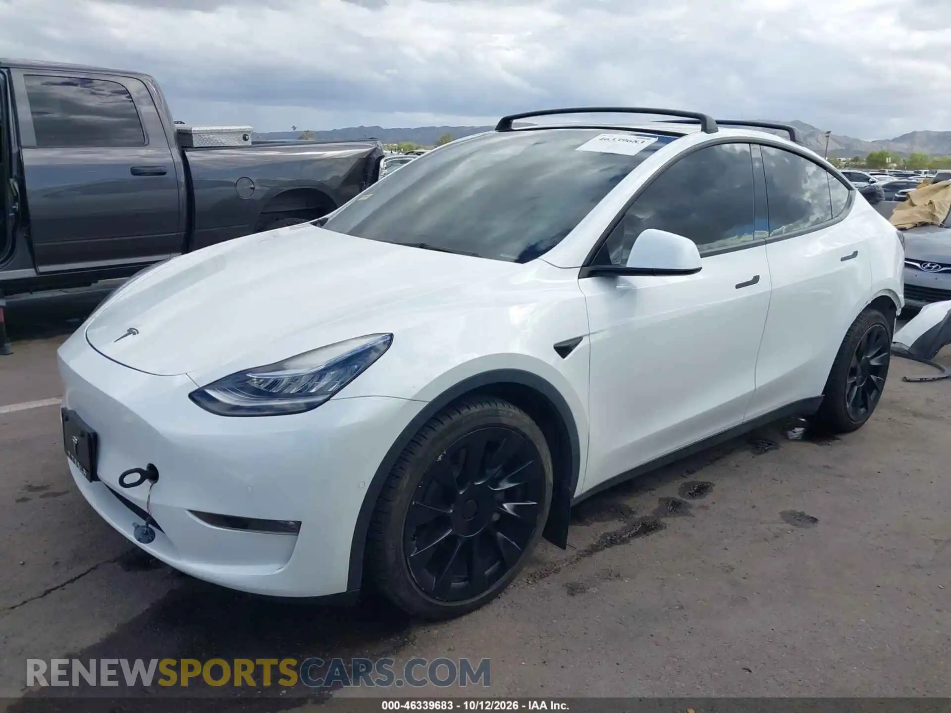 2 fotografías del automóvil dañado 5YJYGAEE9MF212721 TESLA MODEL Y 2021