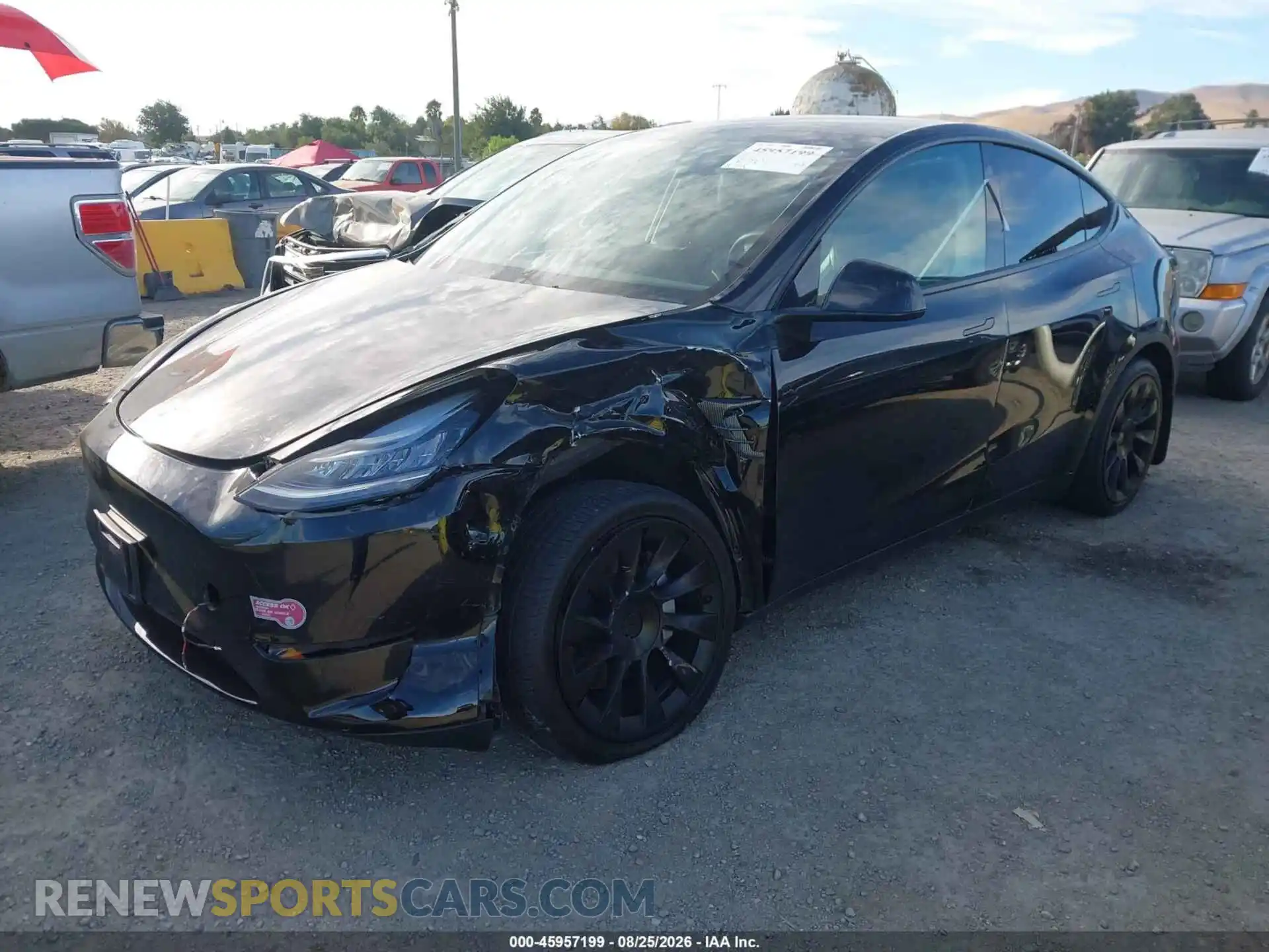 2 fotografías del automóvil dañado 5YJYGAEE9MF296734 TESLA MODEL Y 2021