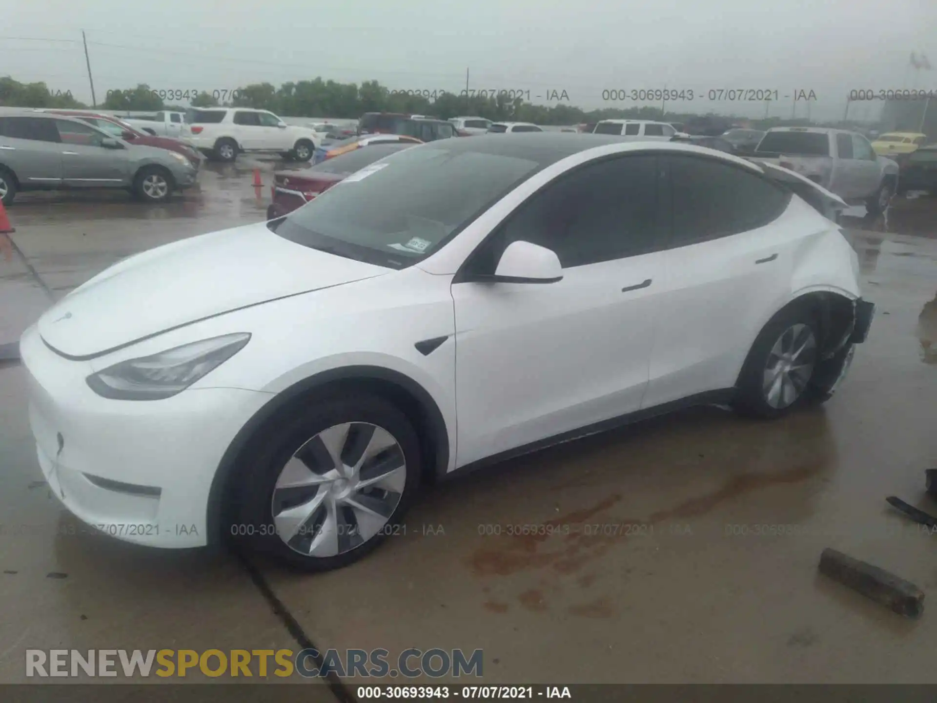 2 fotografías del automóvil dañado 5YJYGDED6MF109152 TESLA MODEL Y 2021