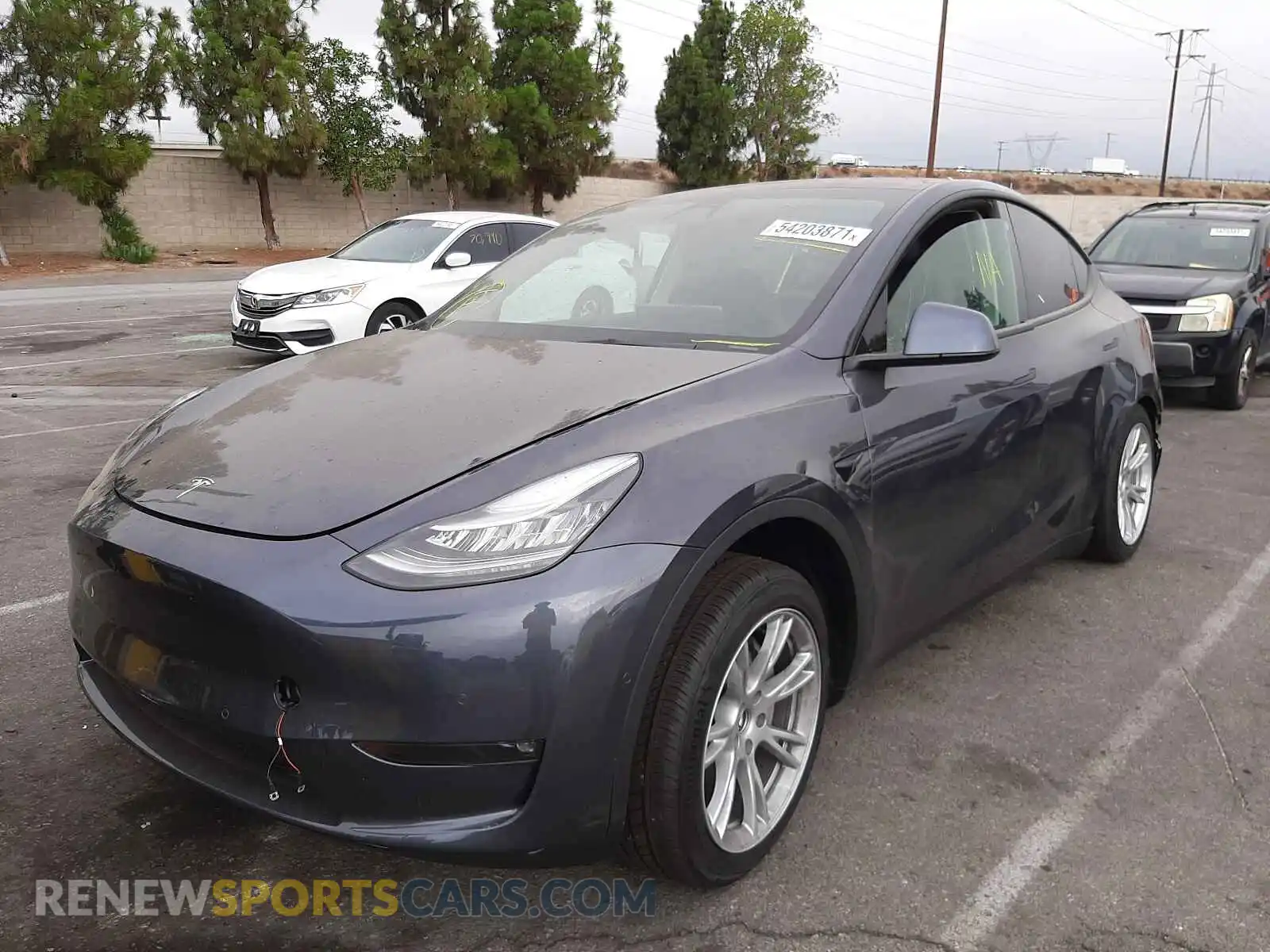2 Photograph of a damaged car 5YJYGDED6MF133001 TESLA MODEL Y 2021