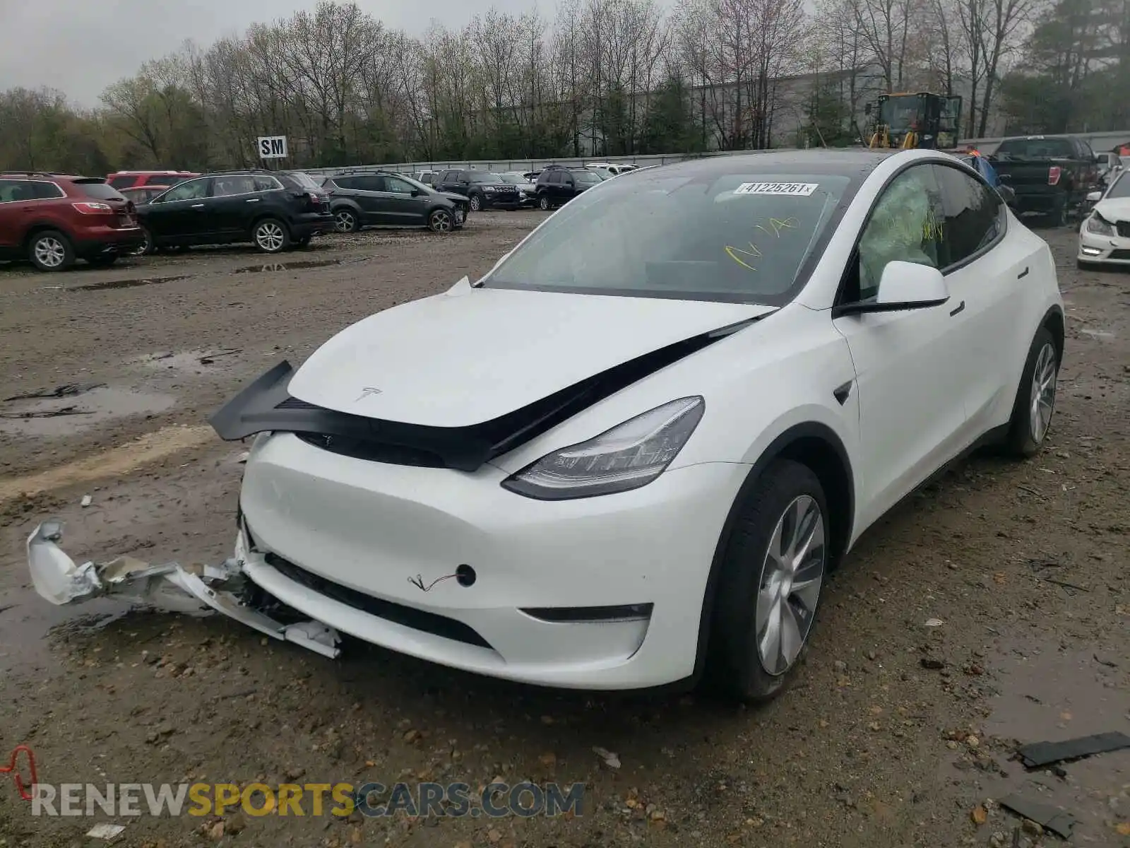2 fotografías del automóvil dañado 5YJYGDED7MF109712 TESLA MODEL Y 2021