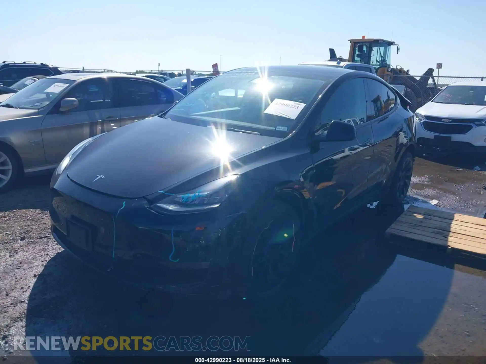 2 fotografías del automóvil dañado 5YJYGDEE0MF193851 TESLA MODEL Y 2021