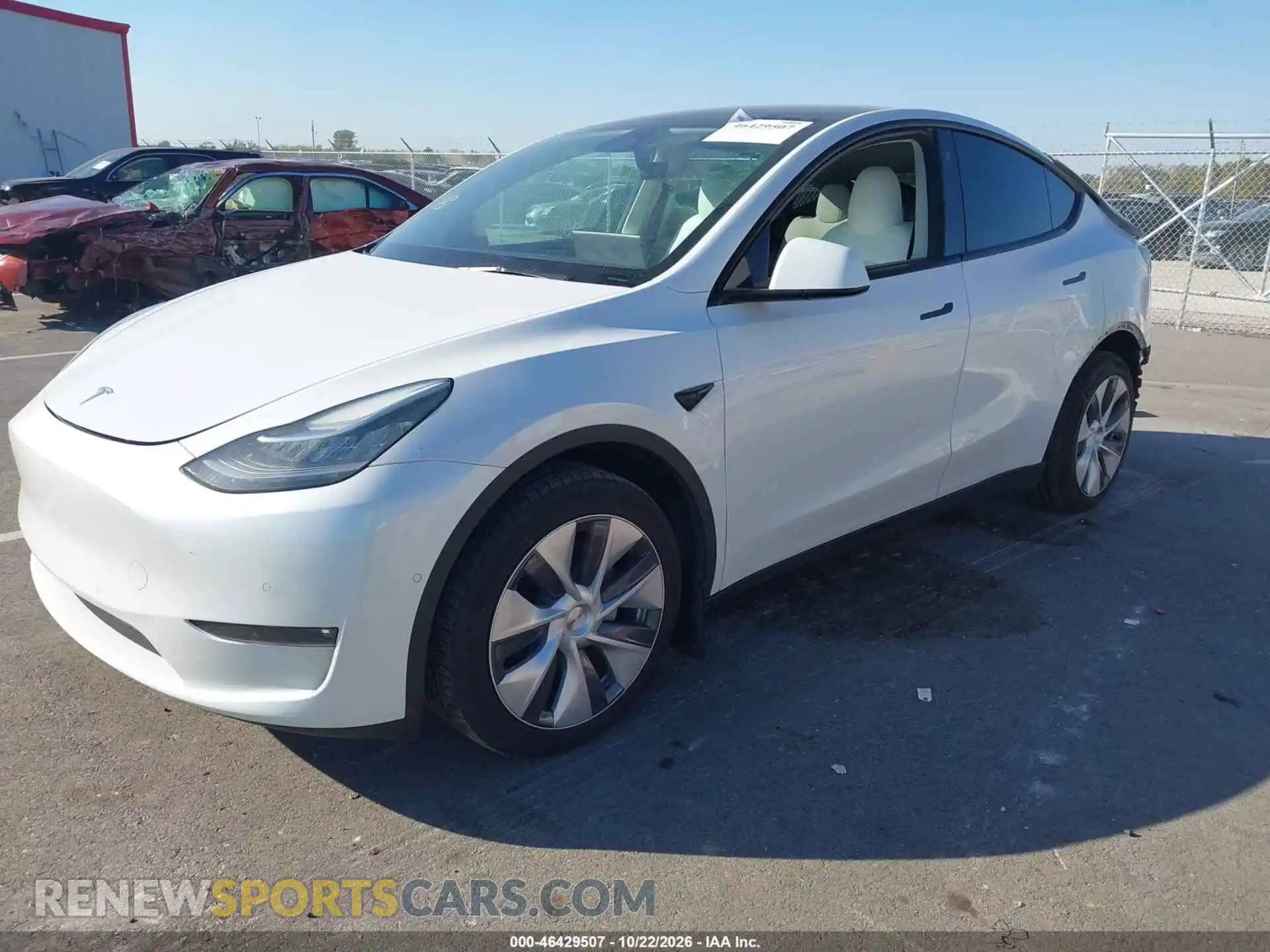 2 fotografías del automóvil dañado 5YJYGDEE0MF295179 TESLA MODEL Y 2021
