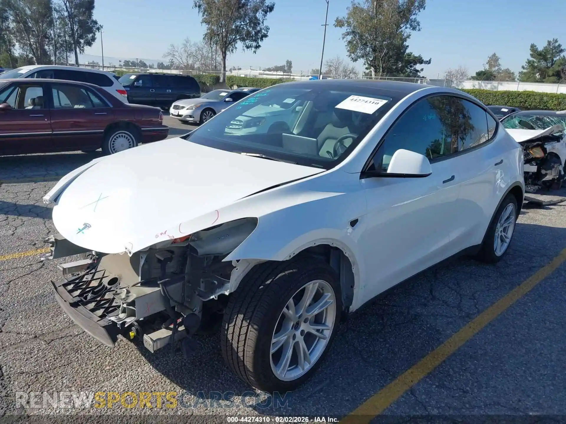 2 Photograph of a damaged car 5YJYGDEE1MF303693 TESLA MODEL Y 2021