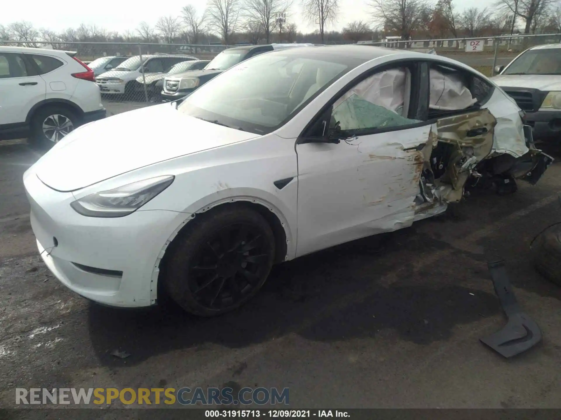 2 Photograph of a damaged car 5YJYGDEE2MF089880 TESLA MODEL Y 2021