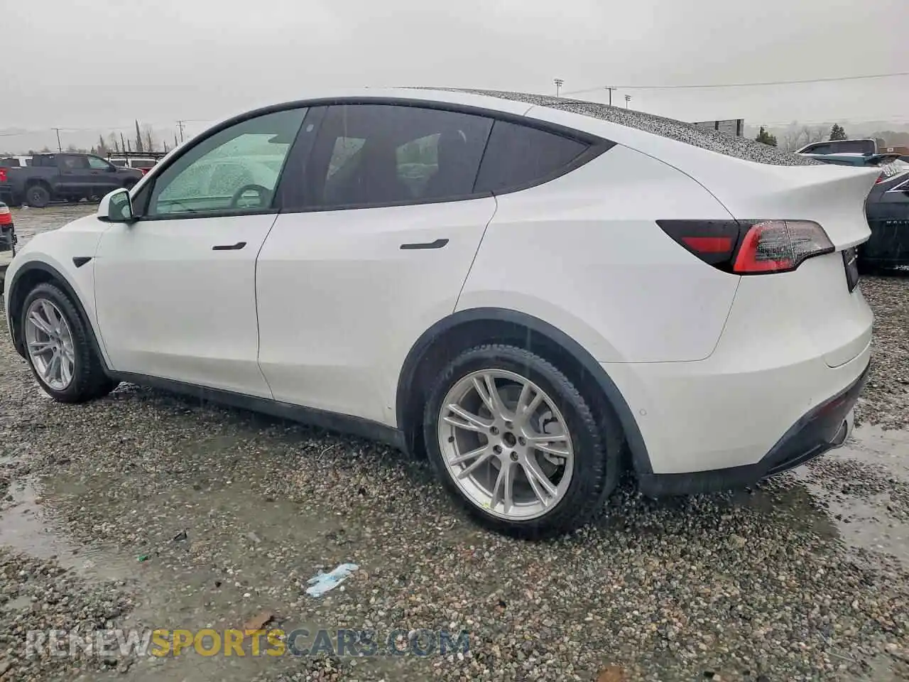 2 Photograph of a damaged car 5YJYGDEE2MF091421 TESLA MODEL Y 2021