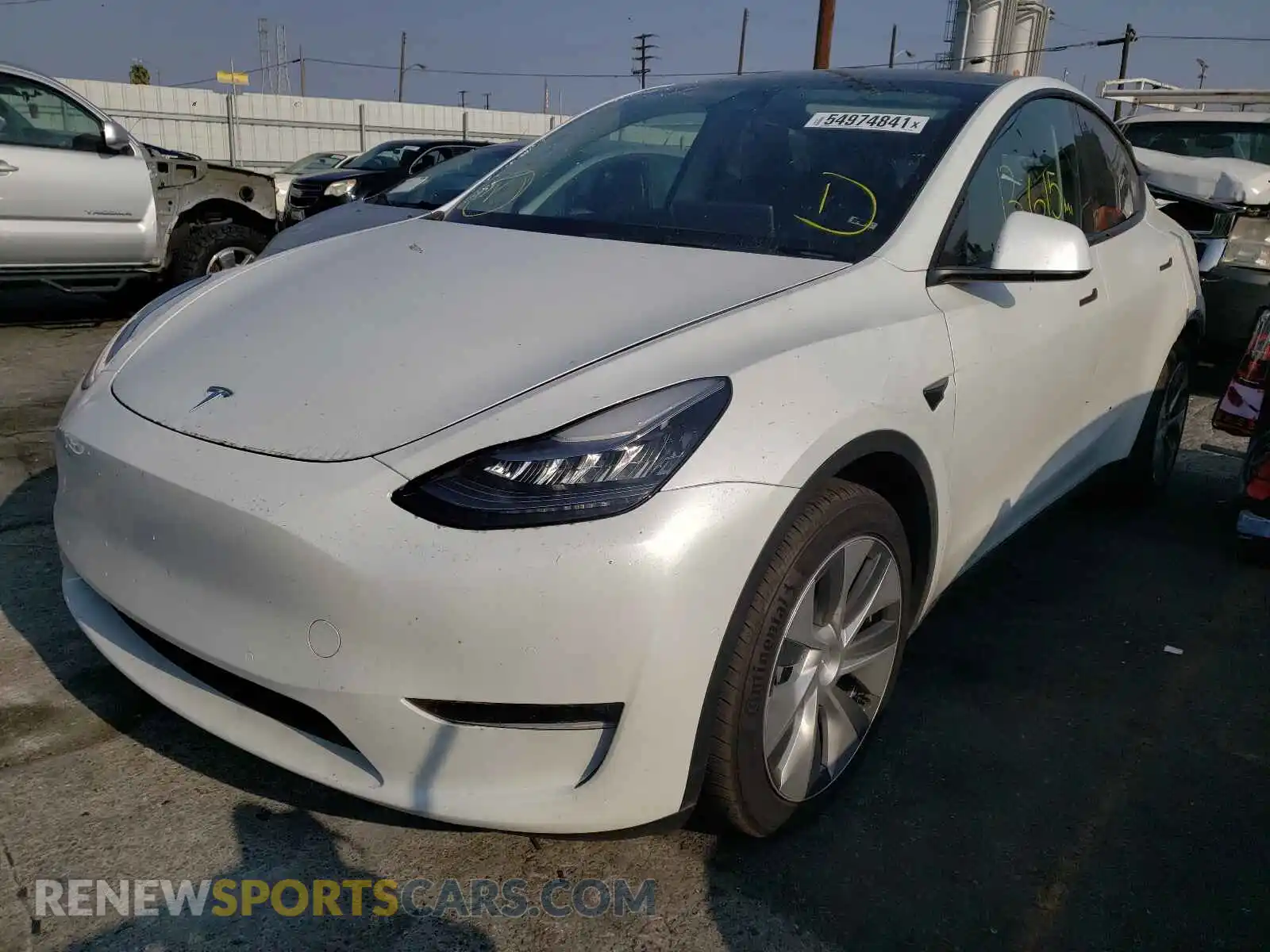 2 fotografías del automóvil dañado 5YJYGDEE2MF095002 TESLA MODEL Y 2021