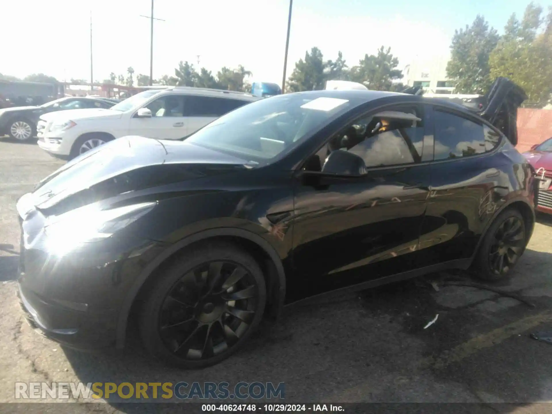 2 Photograph of a damaged car 5YJYGDEE2MF097624 TESLA MODEL Y 2021