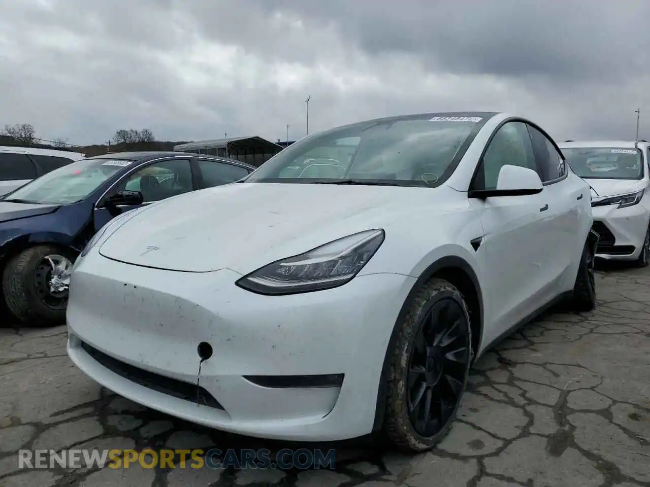 2 Photograph of a damaged car 5YJYGDEE2MF144425 TESLA MODEL Y 2021