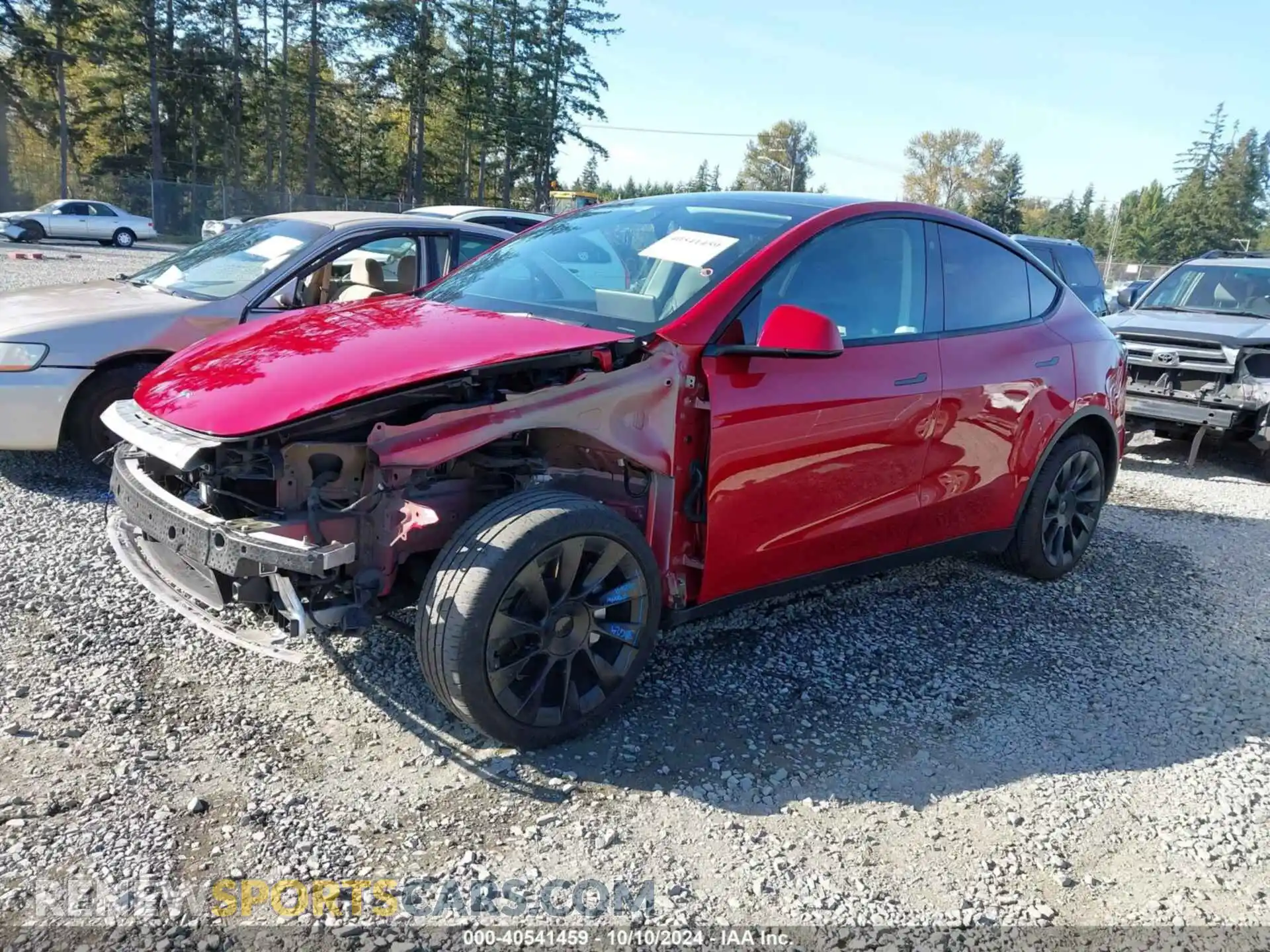 2 fotografías del automóvil dañado 5YJYGDEE2MF217552 TESLA MODEL Y 2021