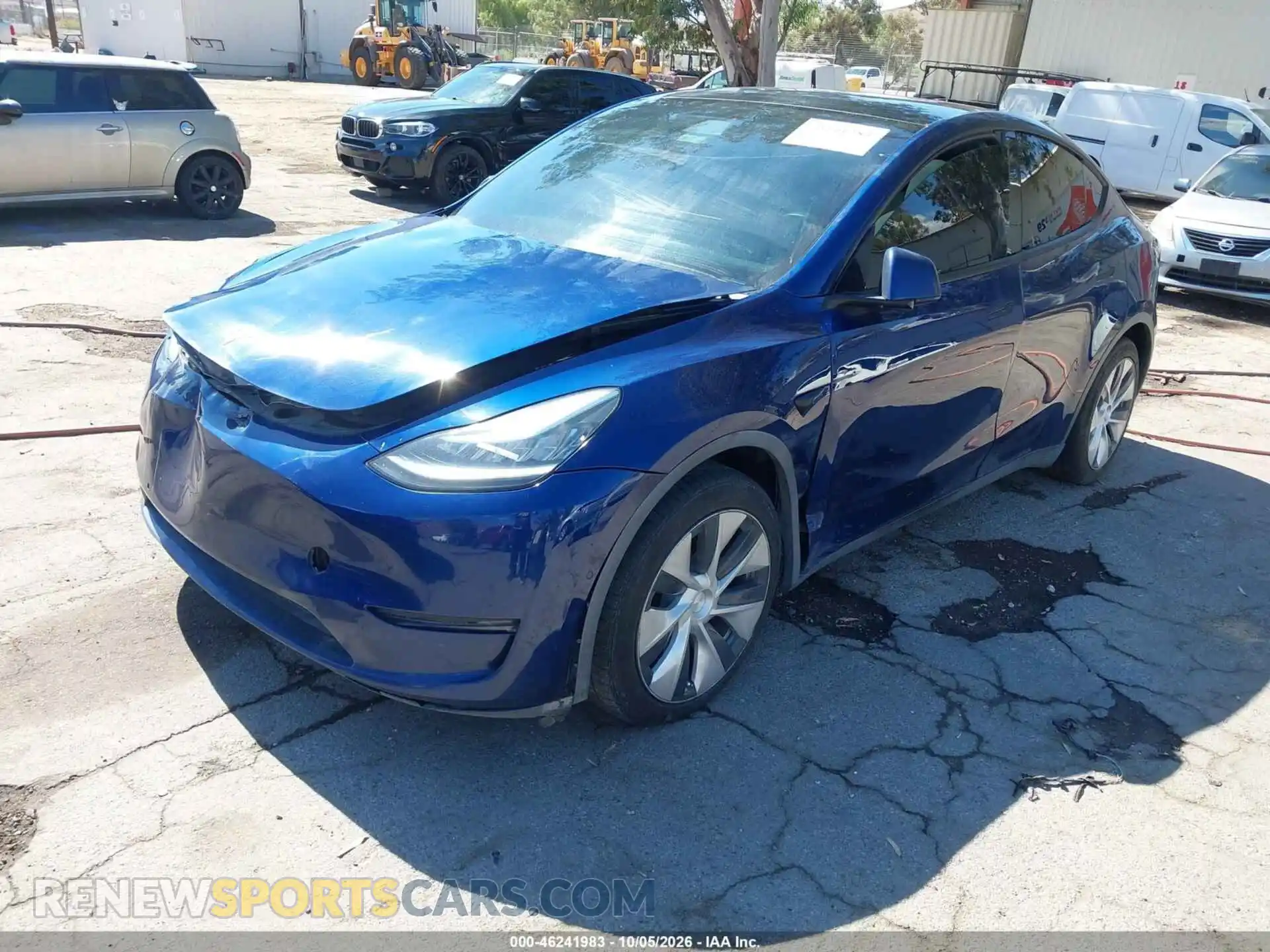 2 fotografías del automóvil dañado 5YJYGDEE2MF240281 TESLA MODEL Y 2021