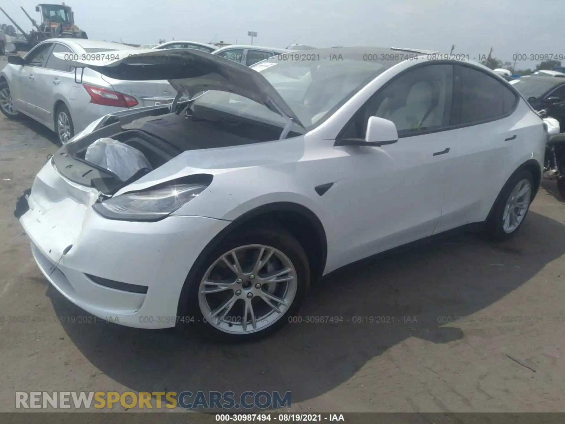 2 Photograph of a damaged car 5YJYGDEE3MF075177 TESLA MODEL Y 2021