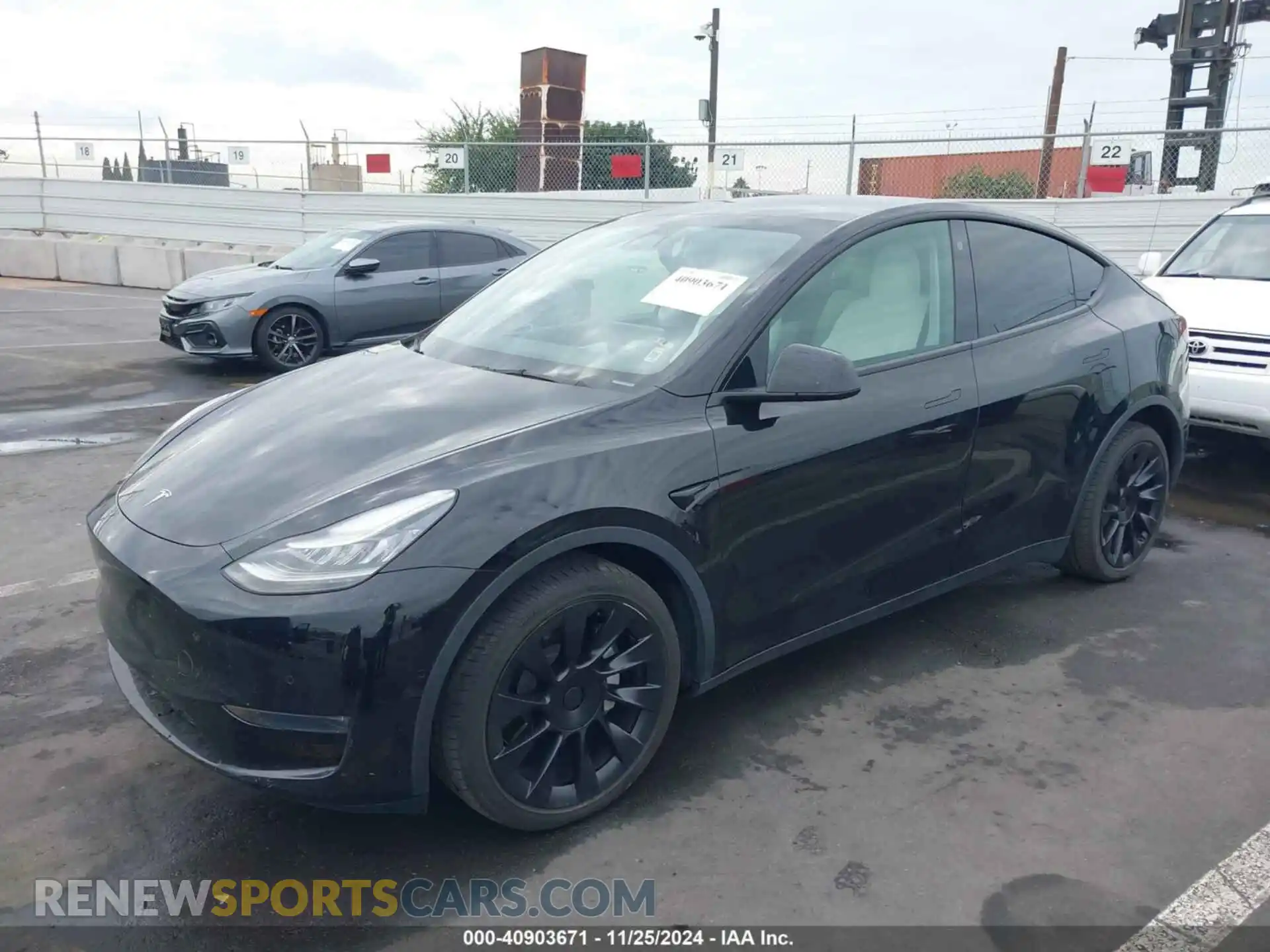 2 fotografías del automóvil dañado 5YJYGDEE3MF093078 TESLA MODEL Y 2021